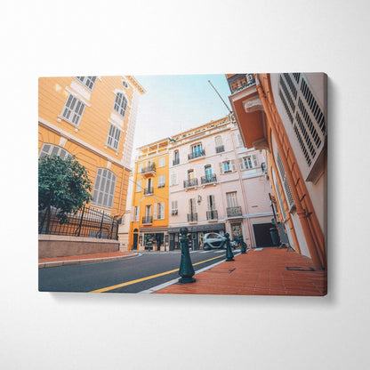 Canvas art wall print featuring exquisite architecture of colorful city buildings under a bright sky.