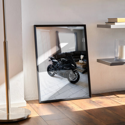 Yamaha R7 motorcycle poster with sleek black bike design, framed wall art leaning on floor.