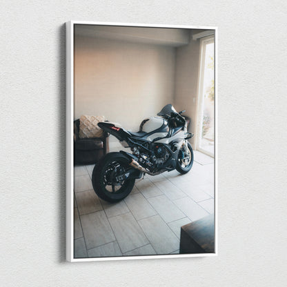 Vertical canvas wall art featuring a detailed BMW S1000RR motorcycle in a modern room setting.