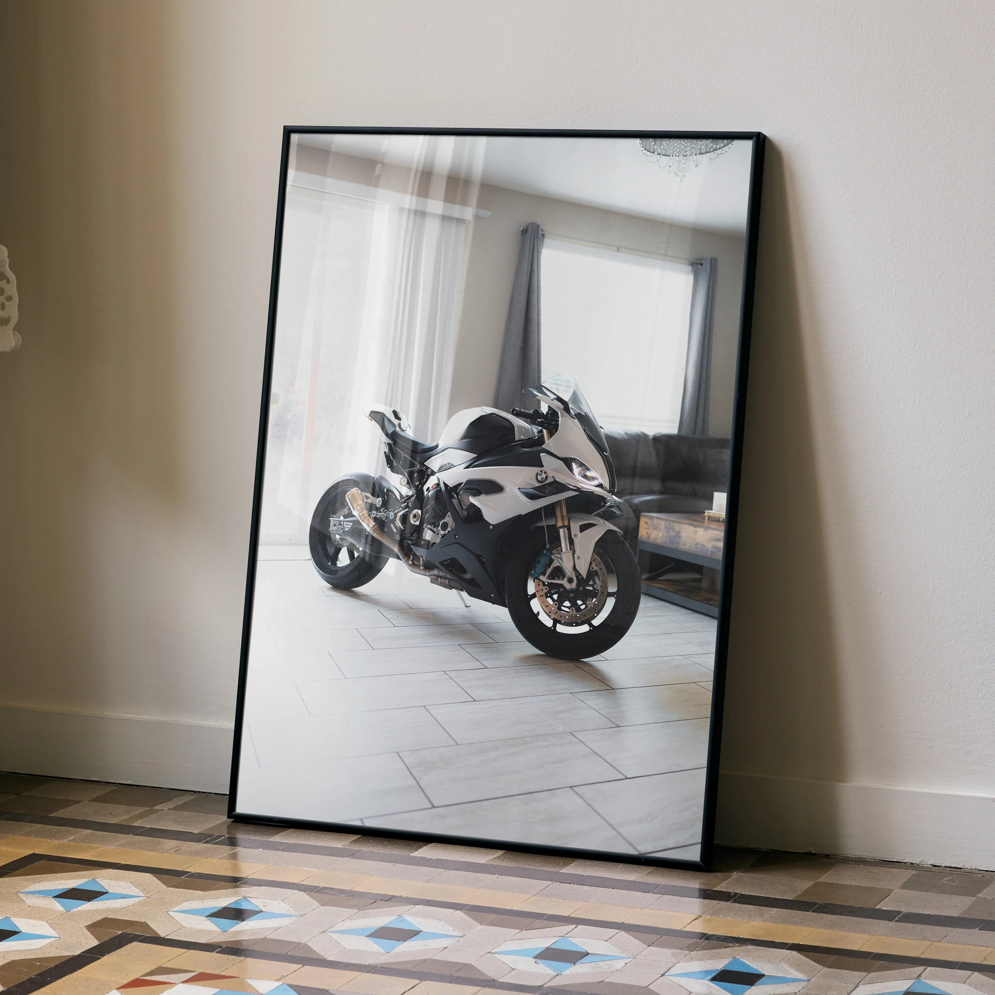 BMW S1000RR motorcycle poster with sleek black and white design displayed as wall art in modern room.