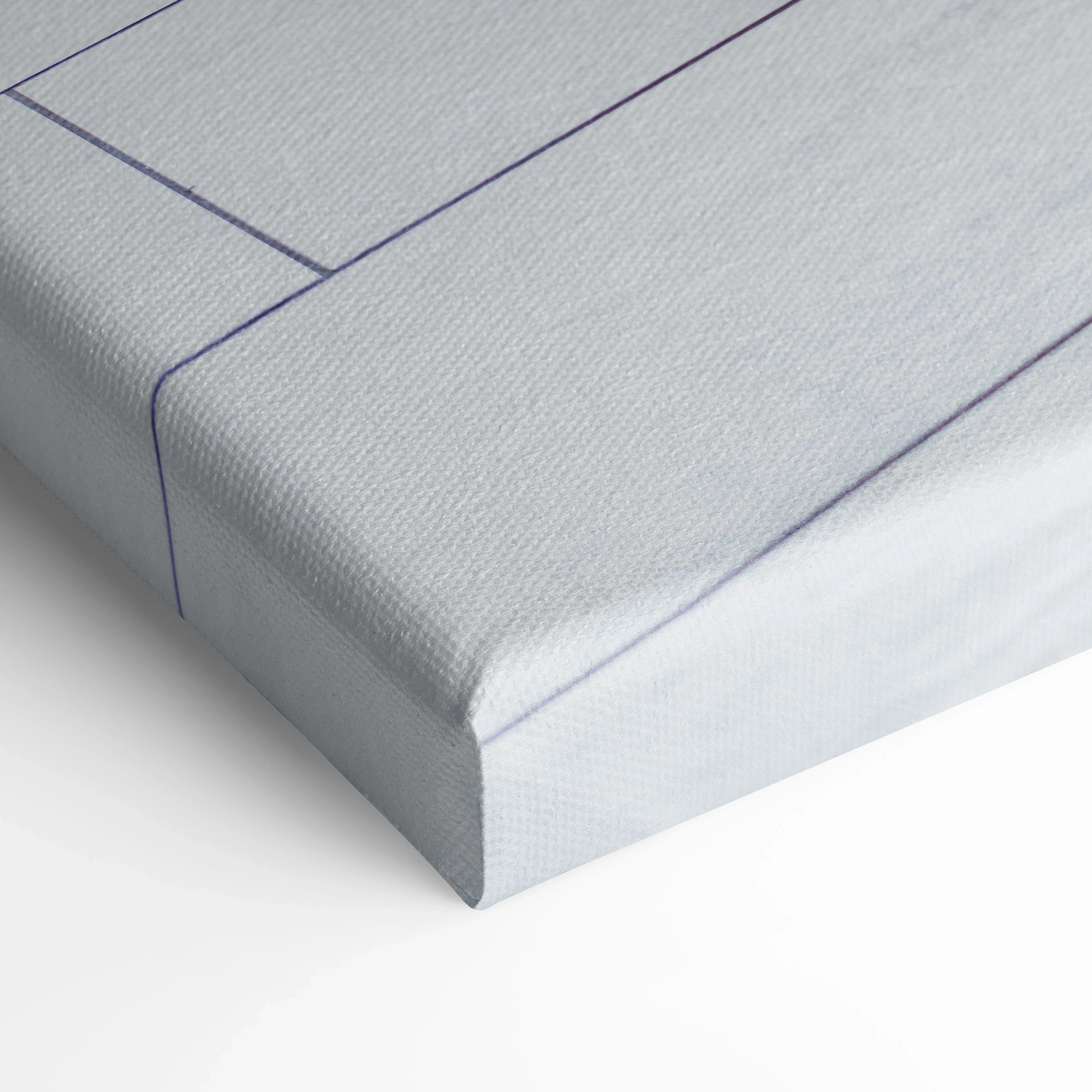 Close-up of textured vertical canvas wall art with detailed corner stitching and clean white surface.