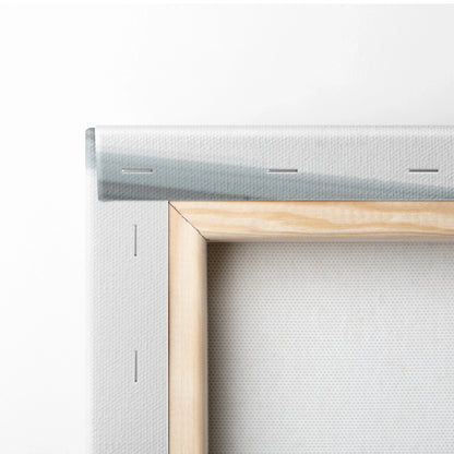 Close-up of wooden stretcher frame and white canvas material for vertical canvas wall art.