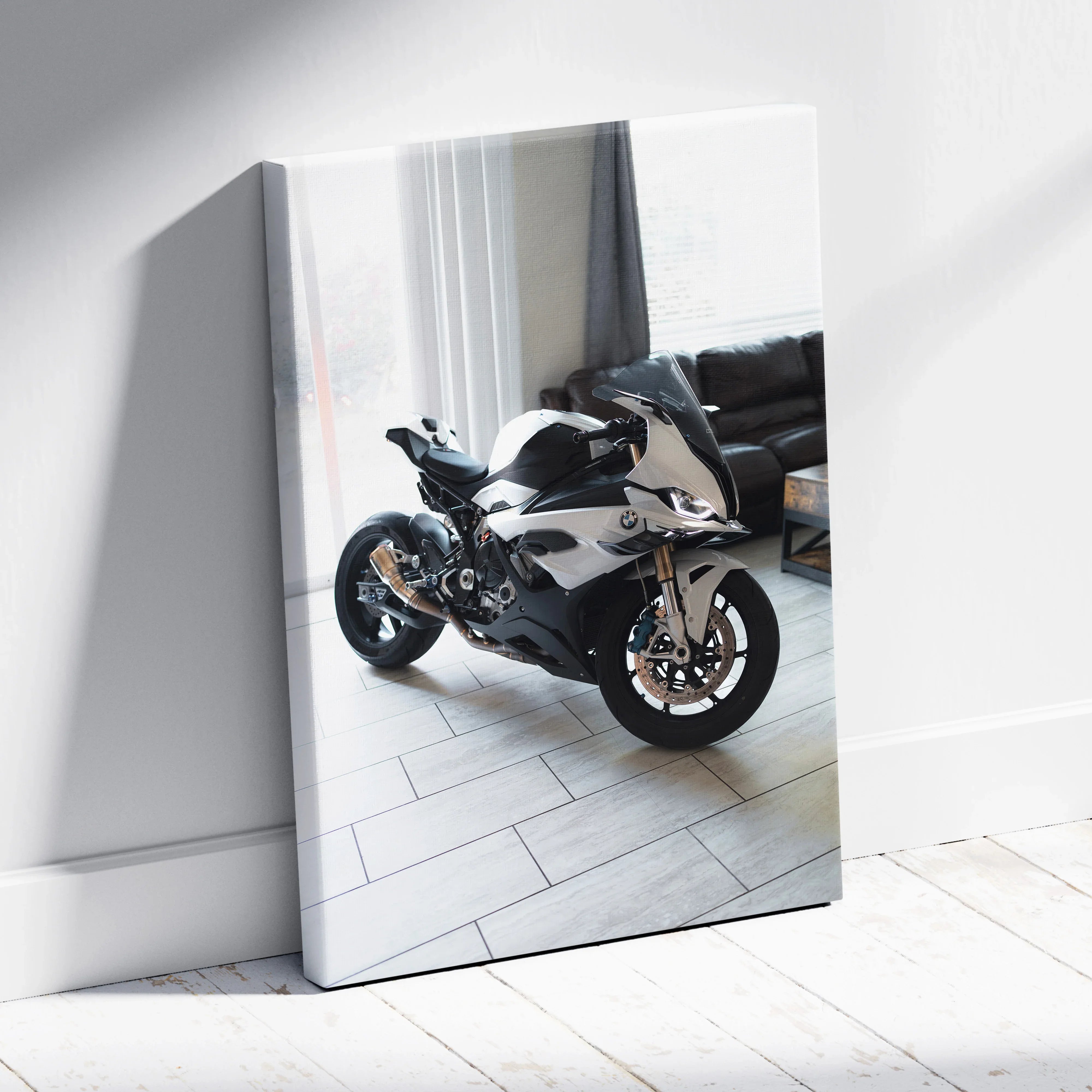 BMW S1000RR motorcycle canvas art with high-resolution museum-quality print leaning against white wall as vertical wall art.