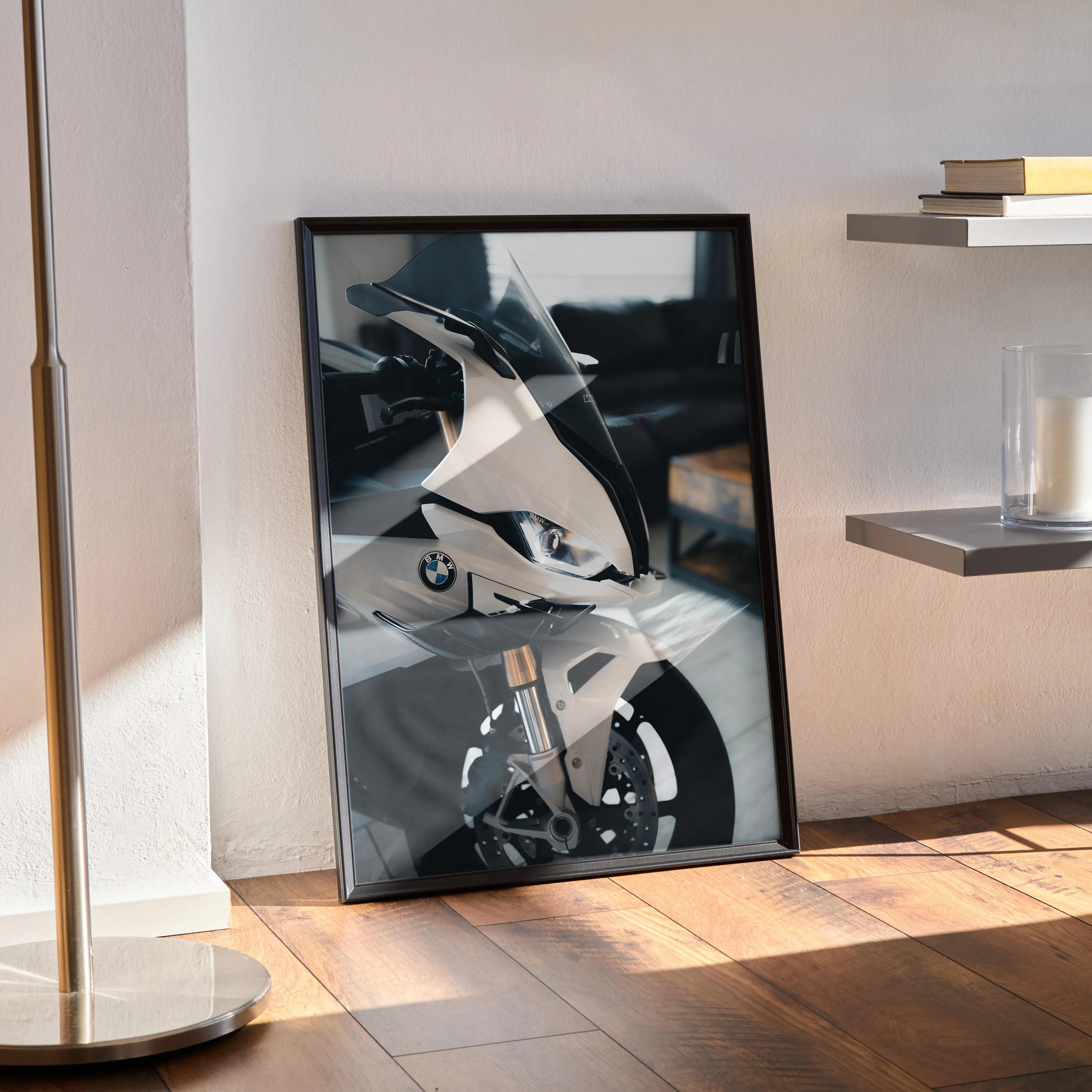 BMW S1000RR motorcycle poster in black frame leaning against wall, modern wall art.
