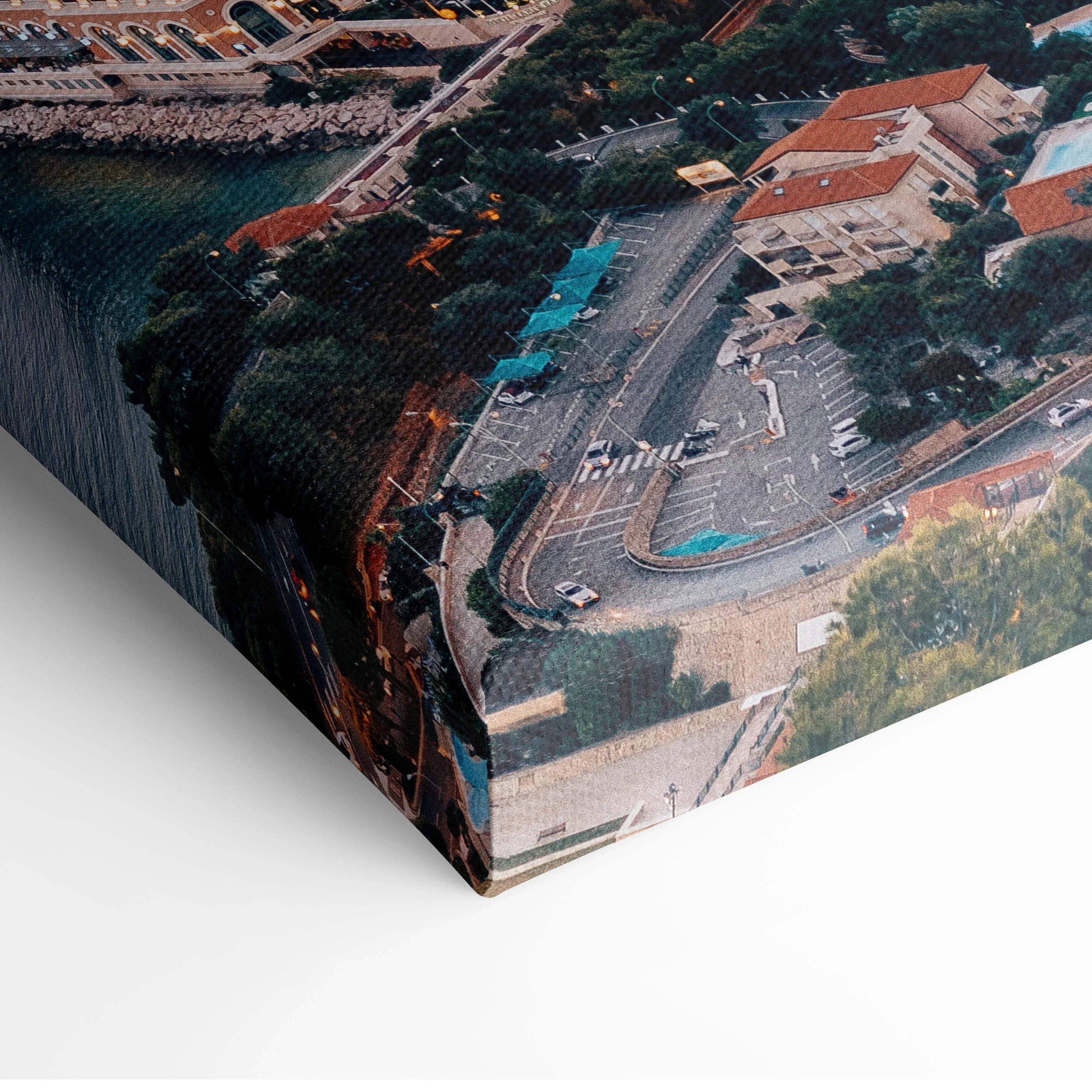 High-resolution canvas art featuring detailed aerial architecture with buildings and roads in rich colors, stretched on a.