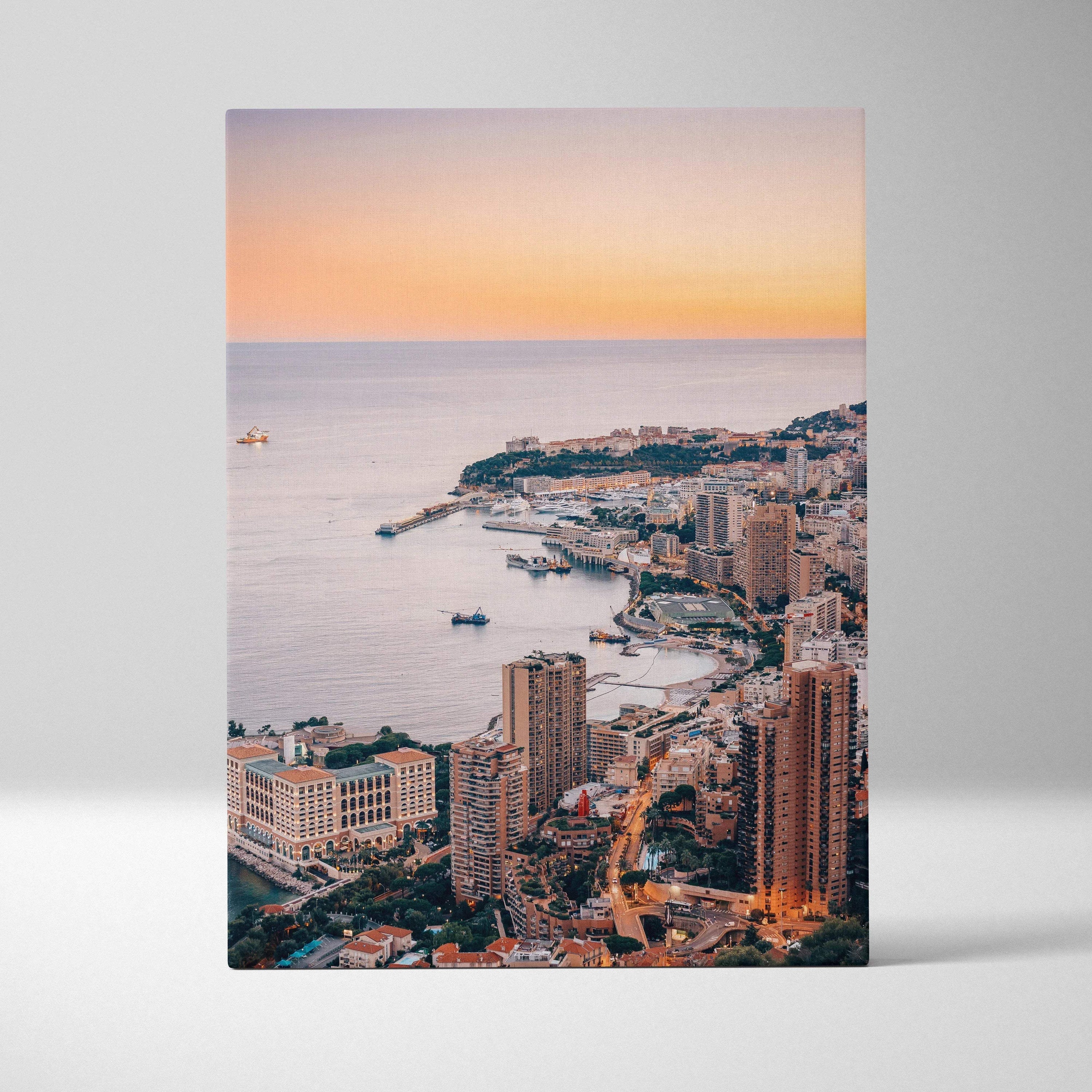 Vertical canvas wall art featuring high-resolution digital cityscape at sunset over water.