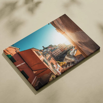 Rectangular canvas art print featuring colorful urban buildings with a bright blue sky, perfect for wall decor.