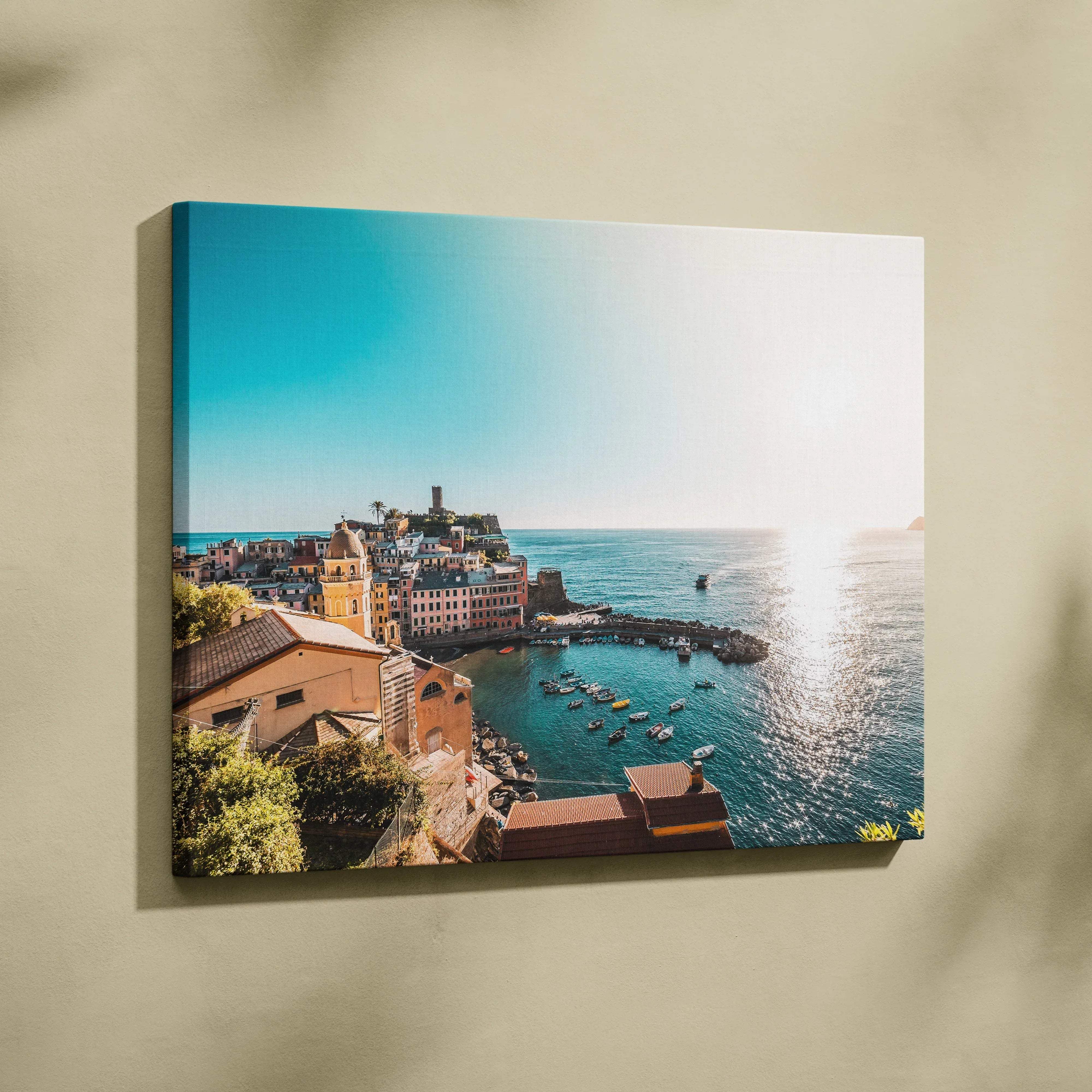 Mediterranean harbor town coastal architecture canvas wall art in bright ocean blues on square canvas with depth mounted on wall