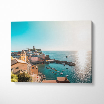 Canvas wall art featuring stunning coastal architecture with boats on ocean water under a clear blue sky.