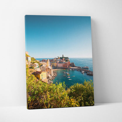 Canvas wall art featuring vibrant coastal architecture with colorful buildings overlooking a calm blue sea under a clear sky.