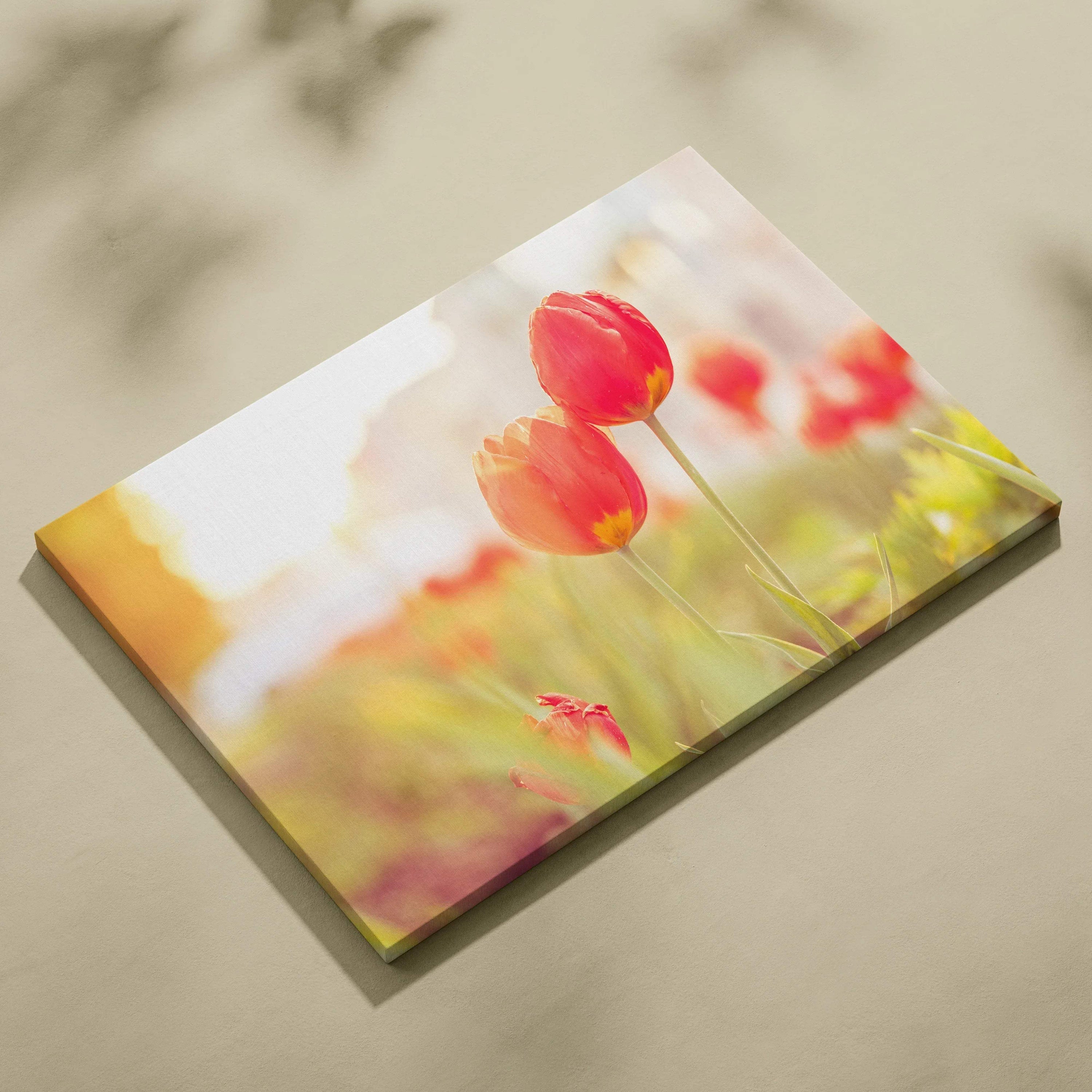 Red tulips floral canvas wall art with soft focus background for elegant home decor.