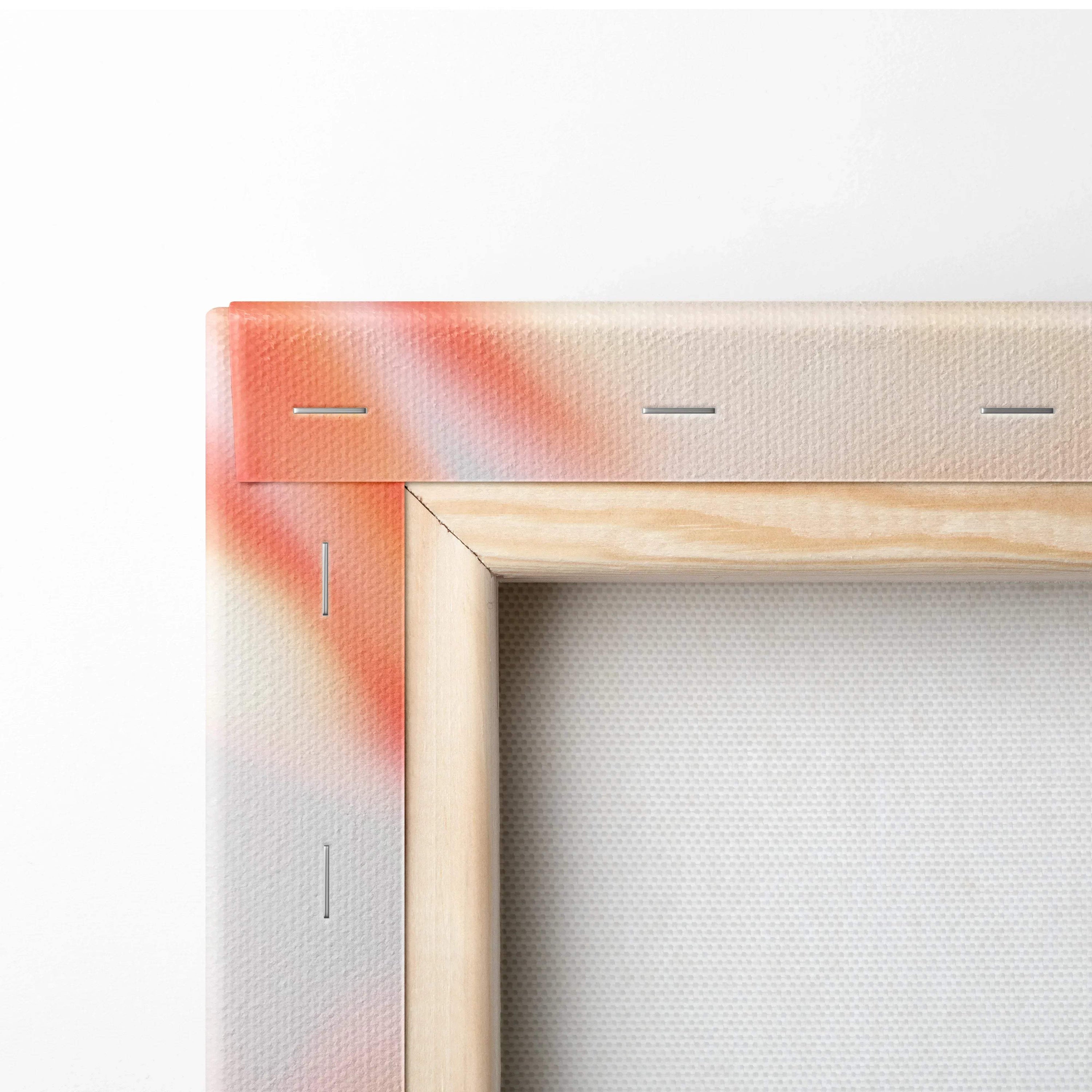 Close-up of stretched canvas corner with wooden frame and stapled edges for wall art decor.