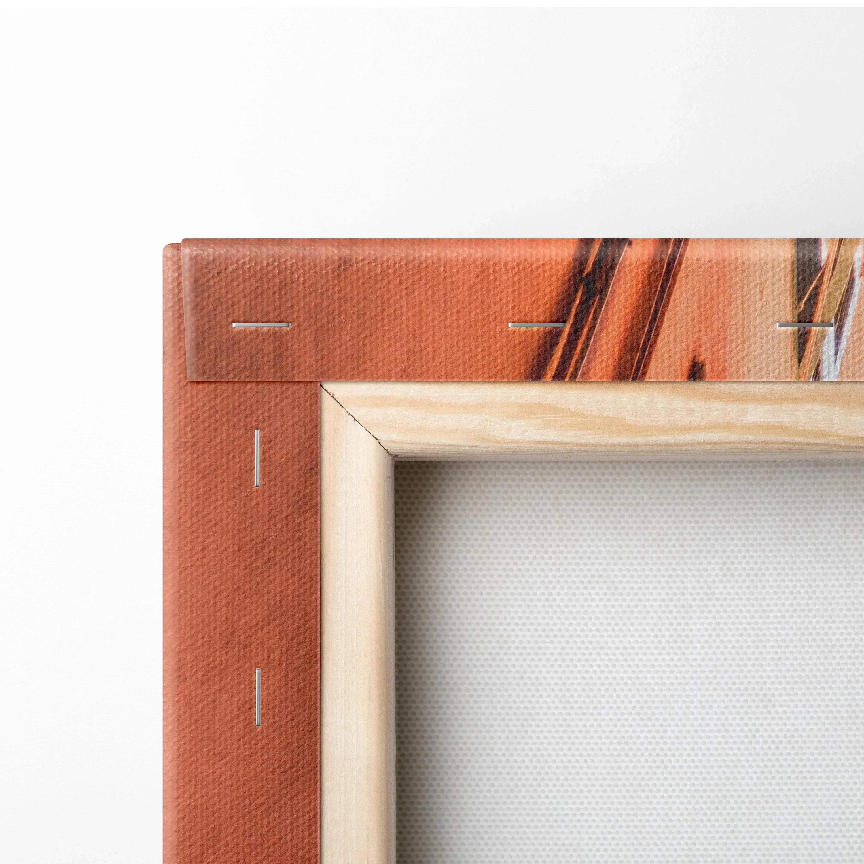 Close-up of corner stretched canvas art print with wooden frame and vibrant architectural design.
