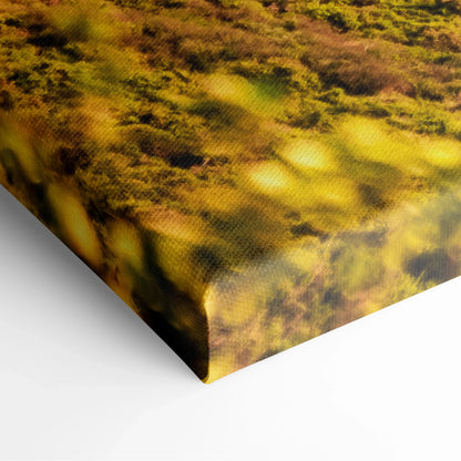 Close-up of textured canvas edge featuring warm yellow and green tones in abstract digital art style.
