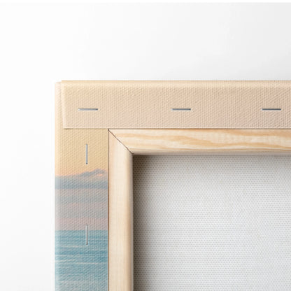 Close-up of stretched canvas with wooden frame showing stapled edges and ocean-themed print on fabric.