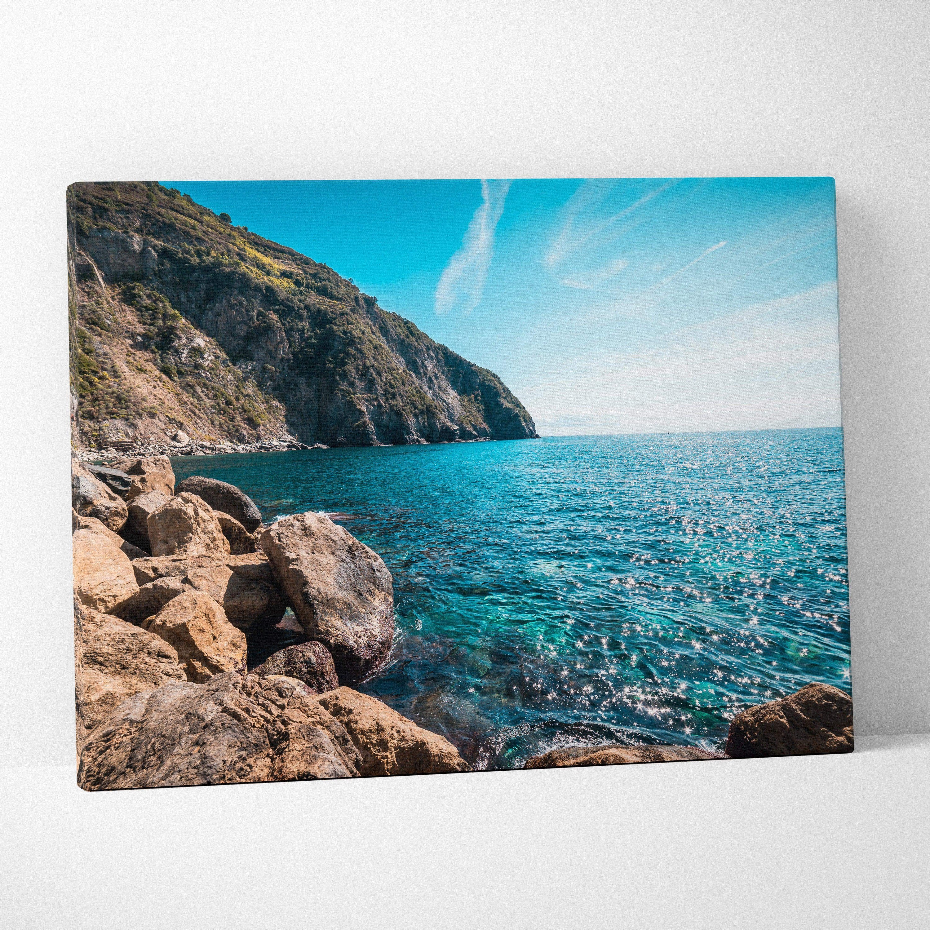 Rocky coastline near Riomaggiore canvas print with turquoise sea and green cliffs