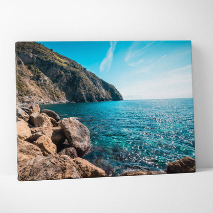 Rocky coastline near Riomaggiore canvas print with turquoise sea and green cliffs