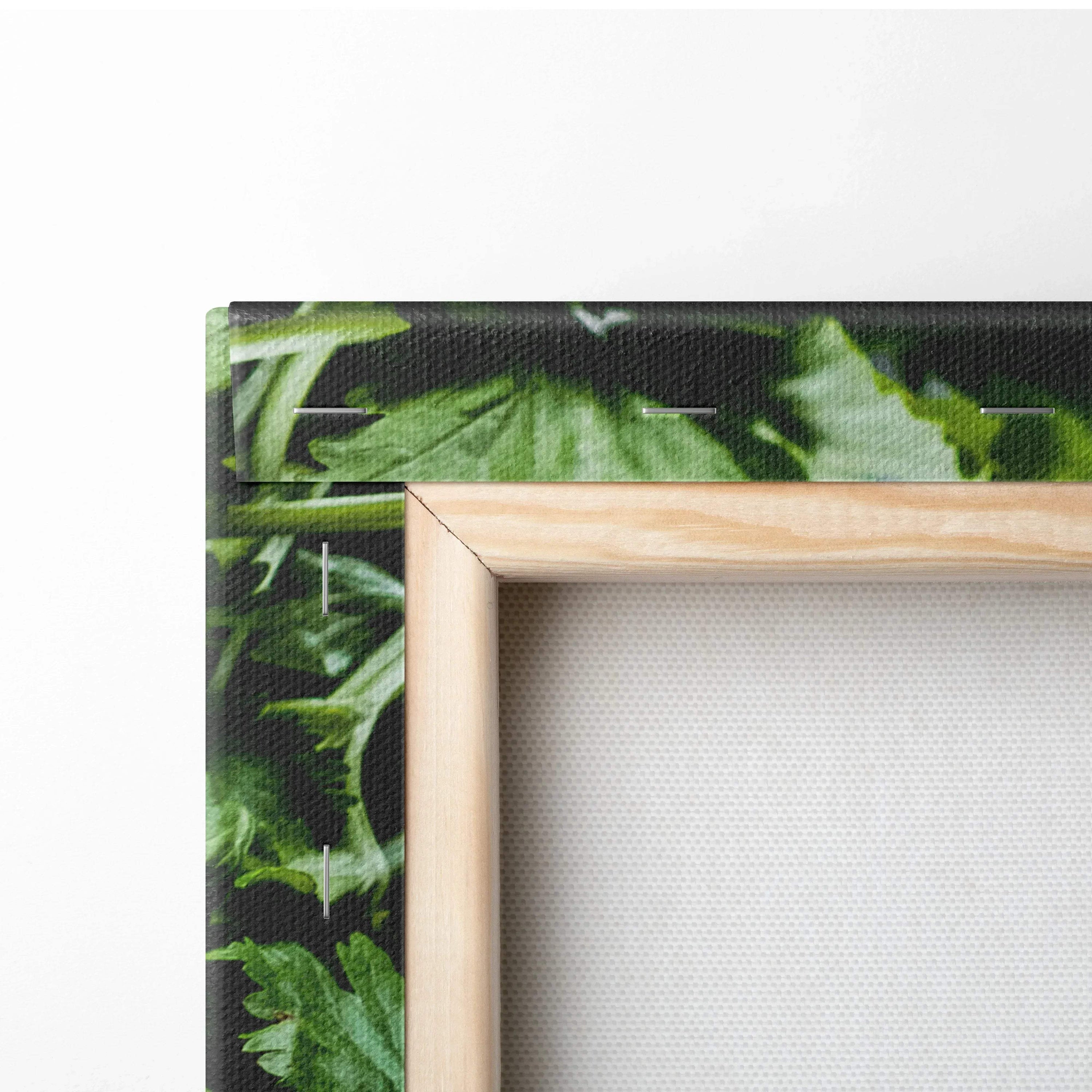 Close-up of salmon dinner canvas print with wooden frame and leafy green background detail on wall art decor.