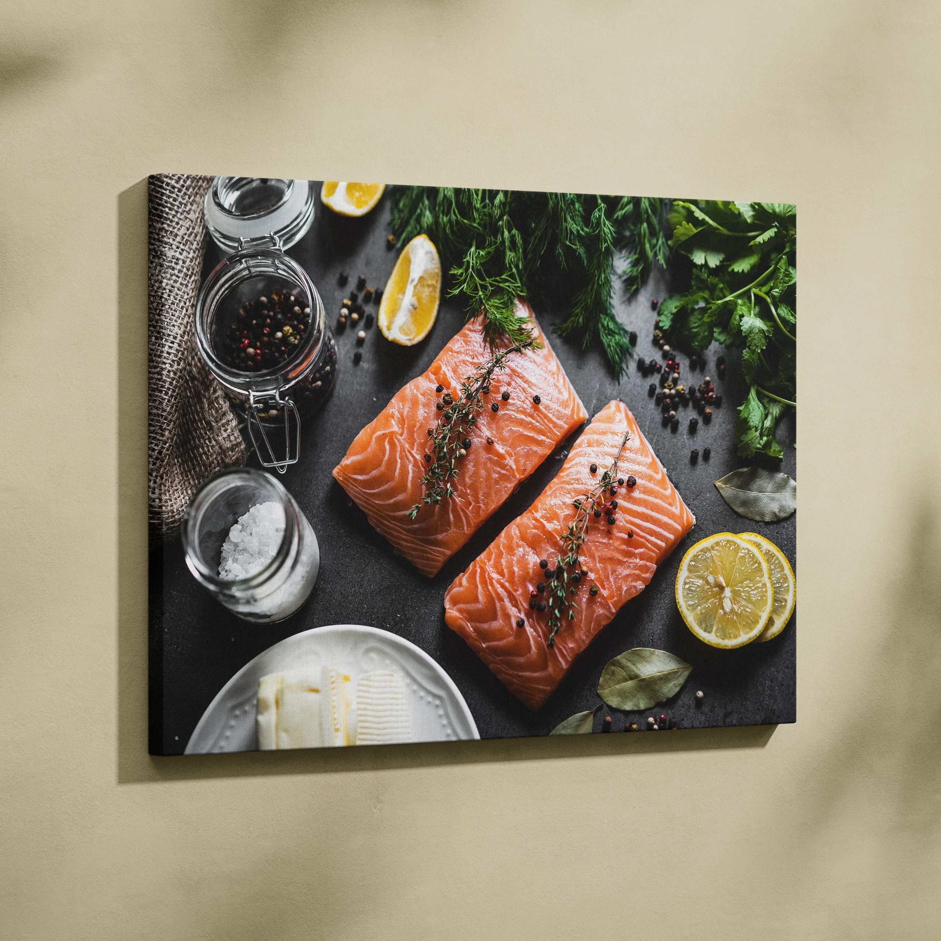 Canvas wall art featuring two raw salmon fillets on a dark surface with lemon slices and herbs.