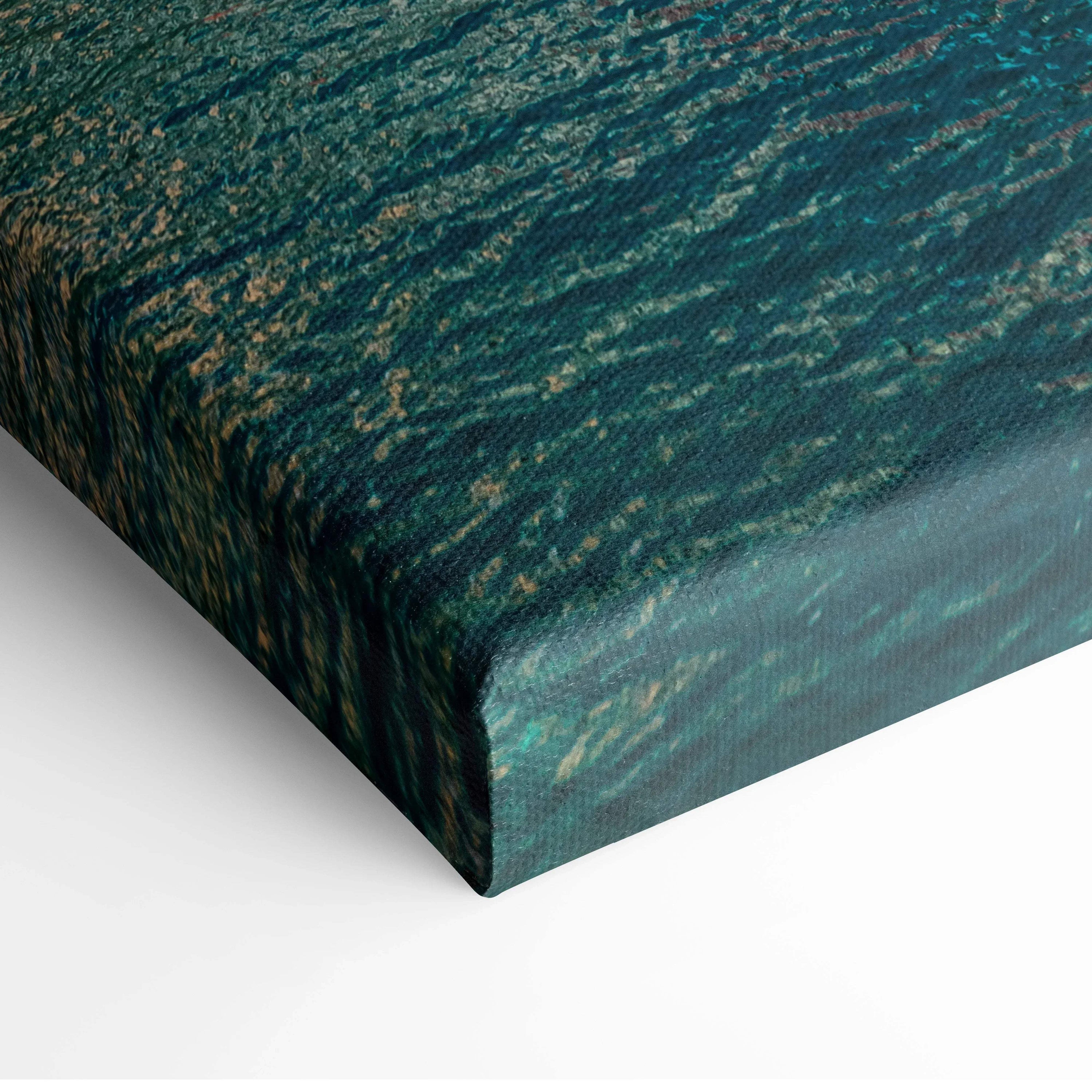 Close-up of canvas art corner showing textured teal and gold abstract architectural design on stretched fabric wall art.