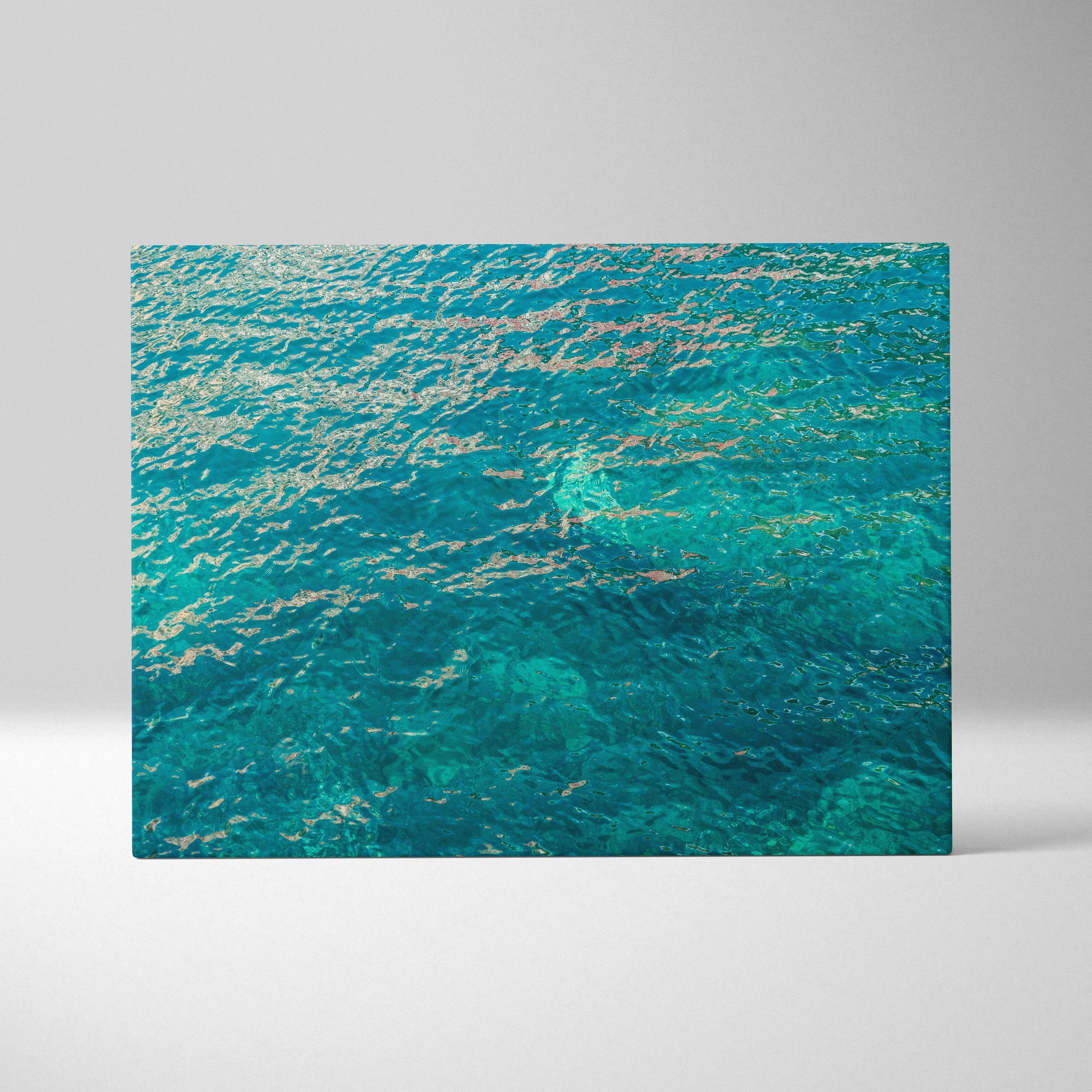 Vibrant turquoise ocean wave canvas print with gold reflections