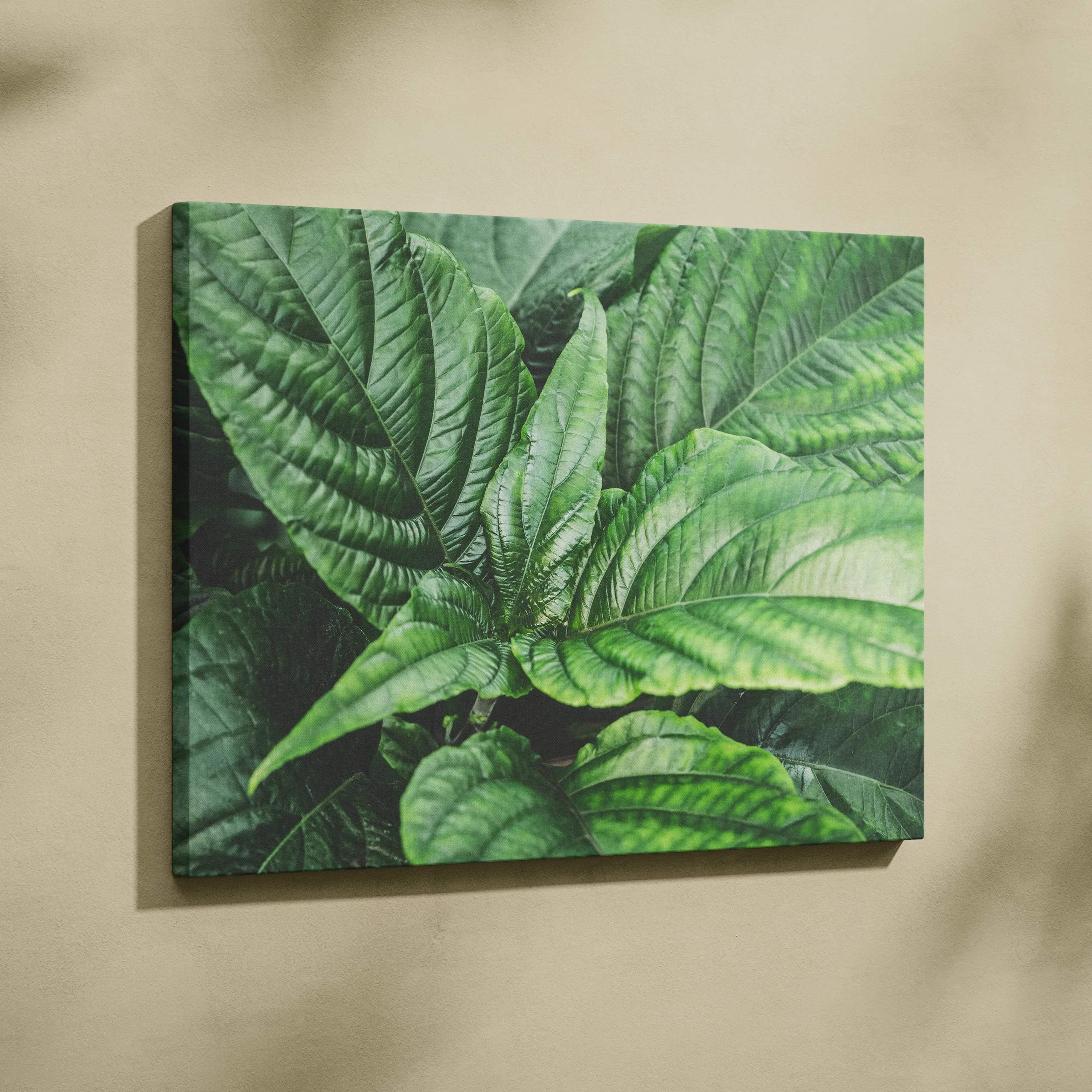 Canvas wall art featuring detailed green leaves with realistic texture and shading on a neutral background.