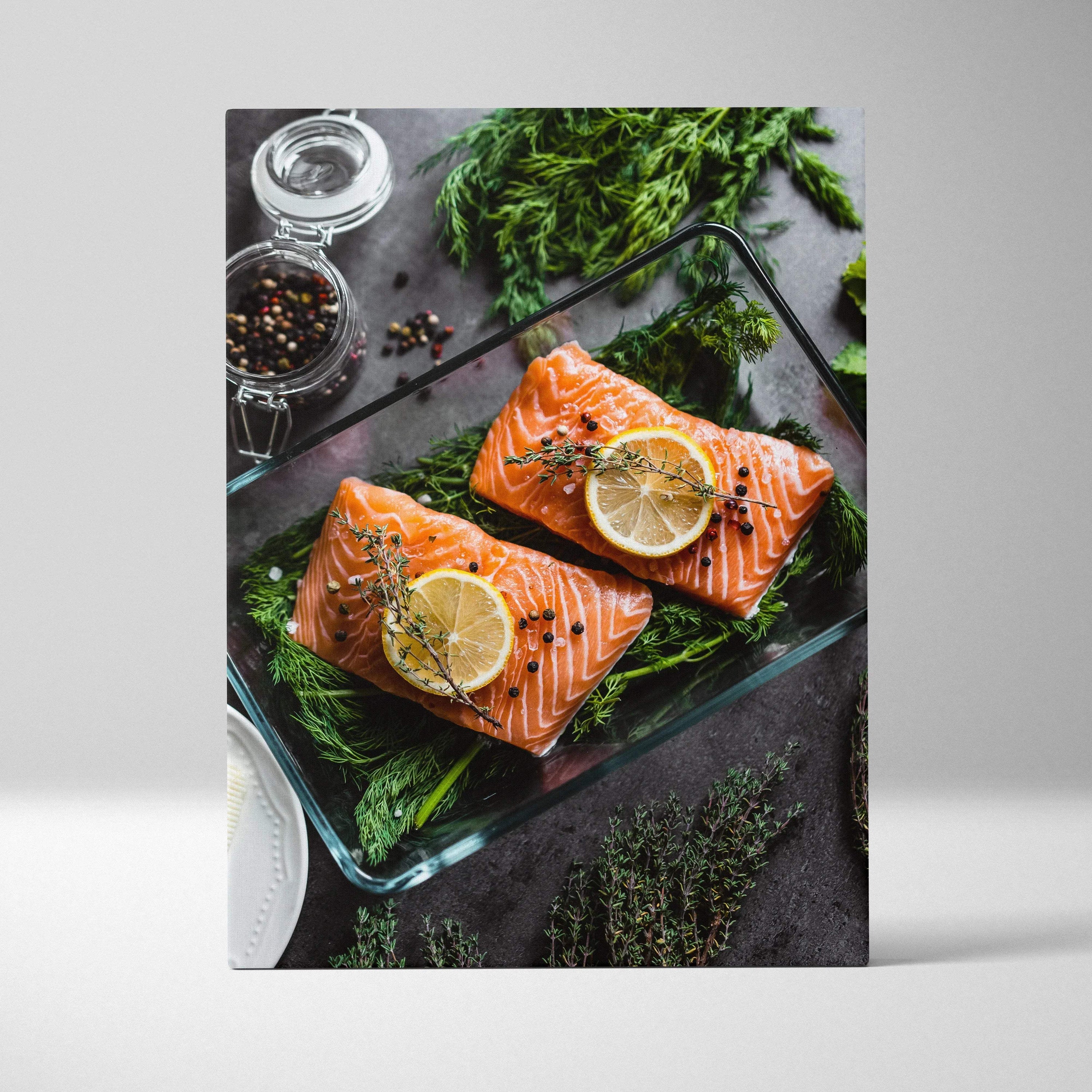 Canvas wall art featuring fresh salmon fillets topped with lemon slices on a bed of herbs.