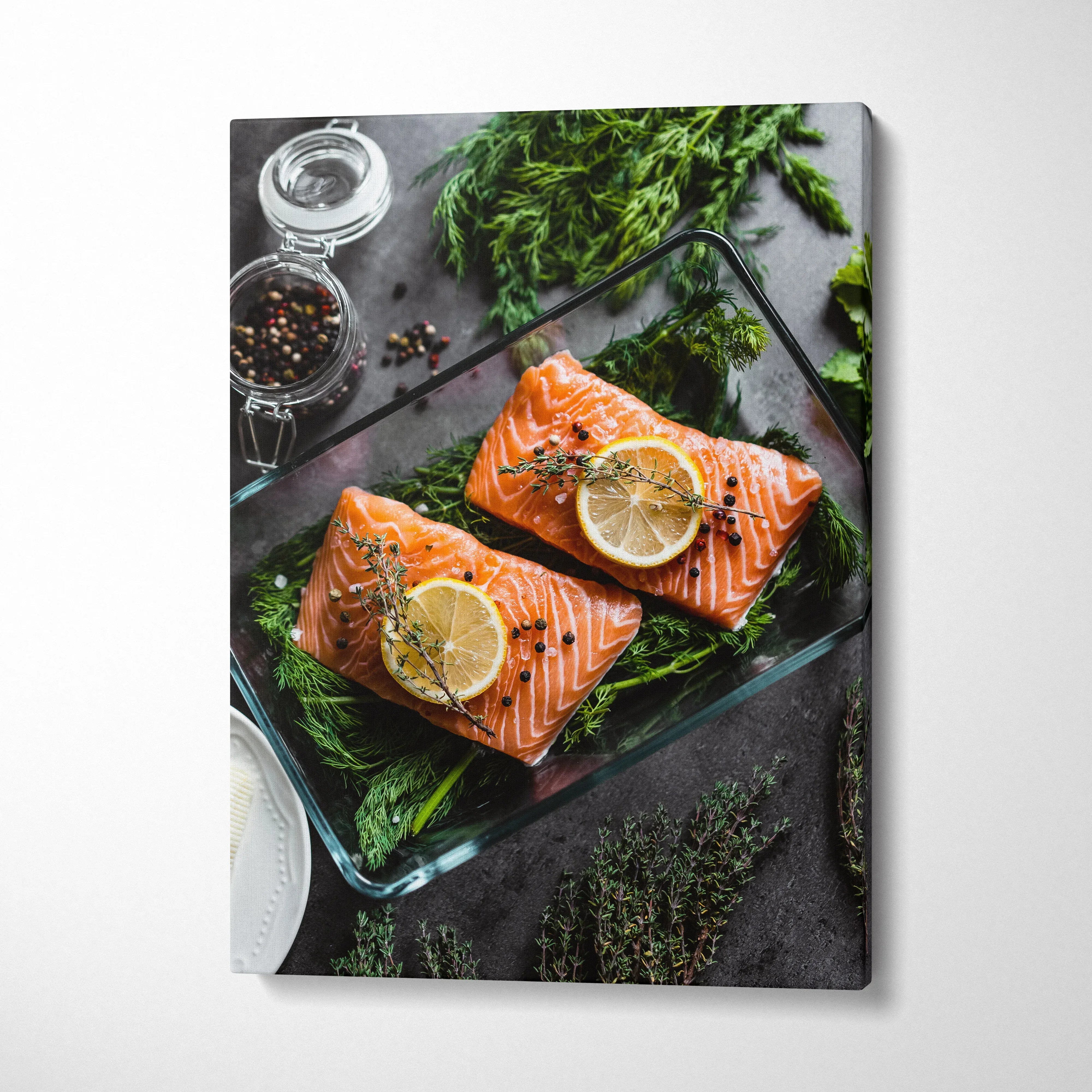 Canvas wall art featuring fresh salmon fillets topped with lemon slices and herbs on a dark rustic background decor.
