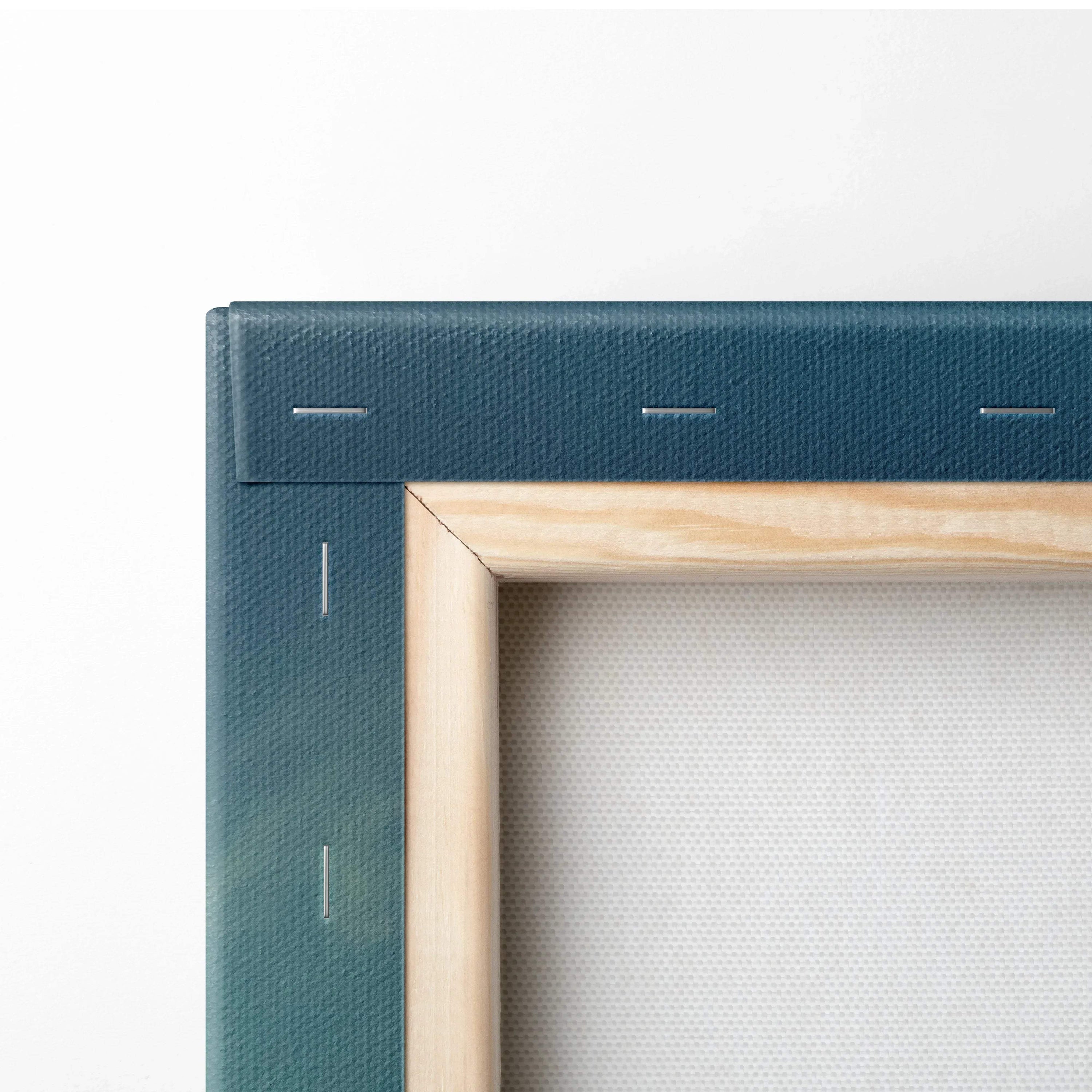 Close-up of wooden frame and blue canvas backing corner for floral wall art decor.