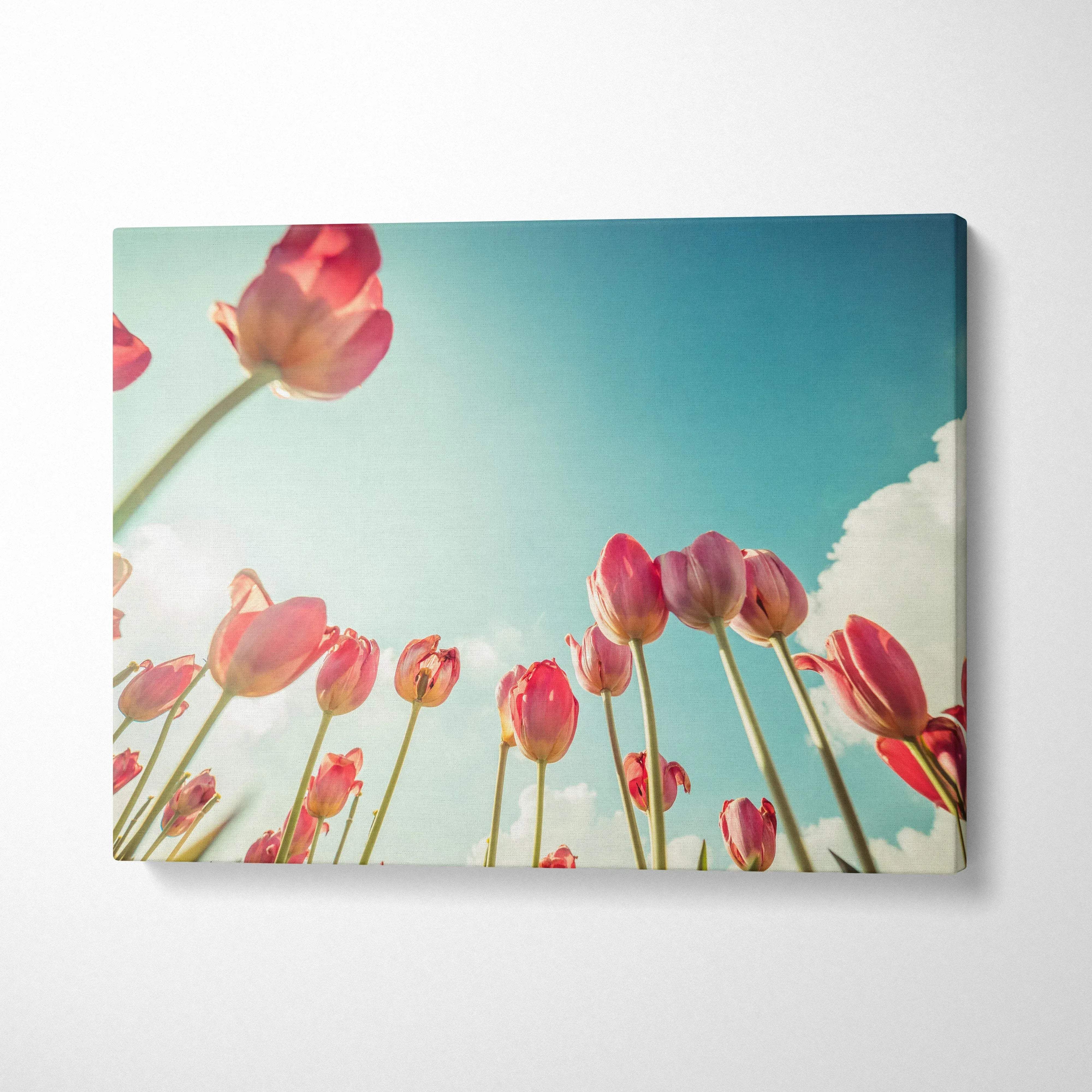 Red tulips against blue sky canvas wall art for modern home decor.