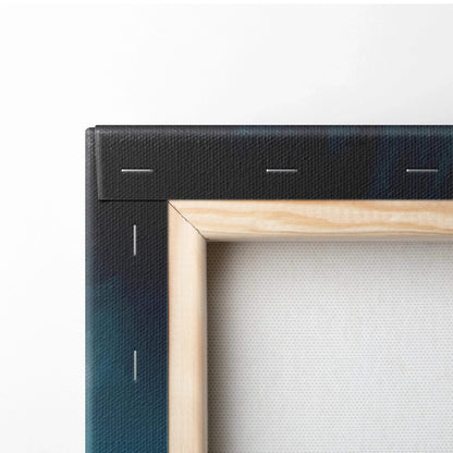 Close-up of stretched canvas art on wooden frame with black painted edges and visible staples.