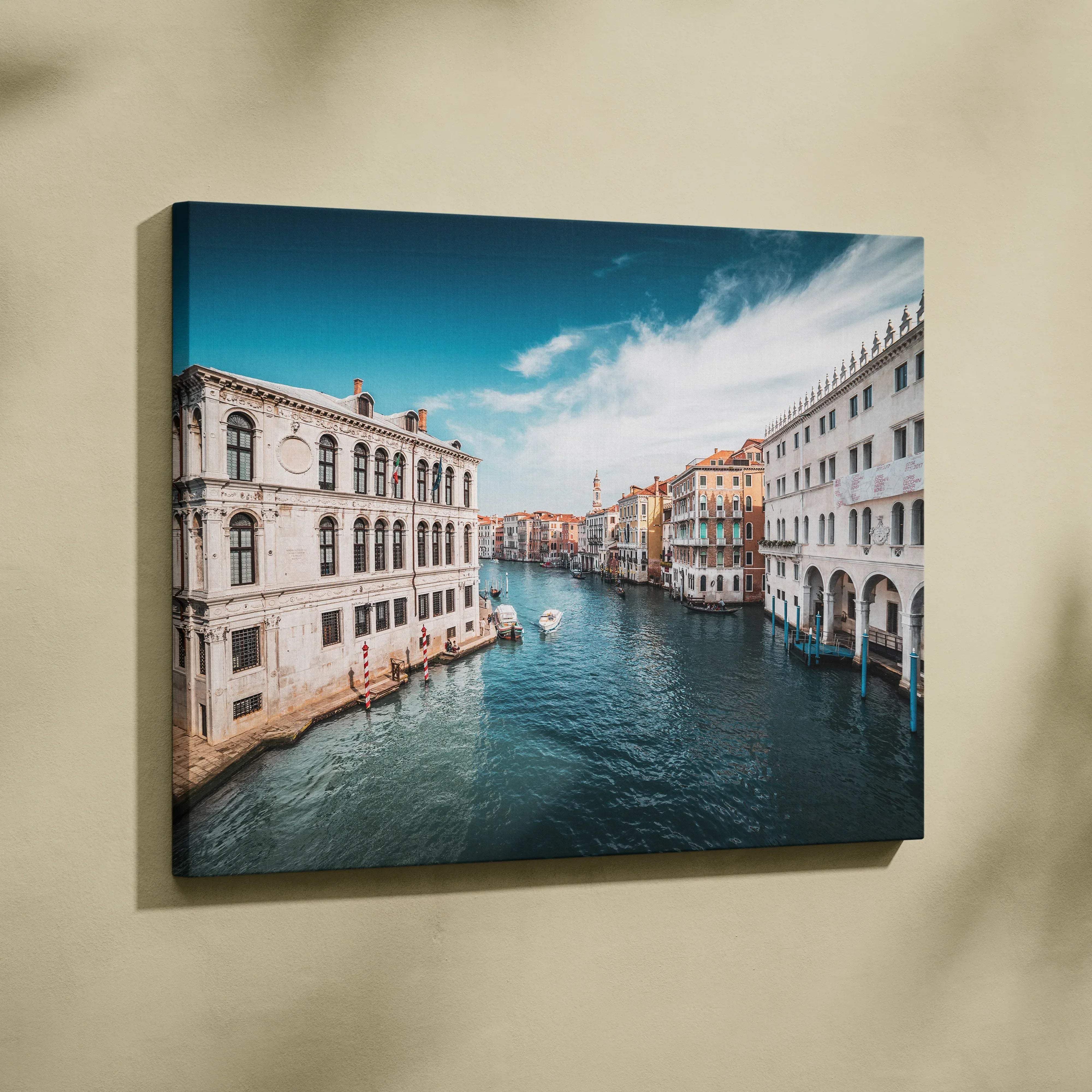 A vibrant canvas wall art of venice grand canal with ornate buildings and deep blue waterway under bright sky