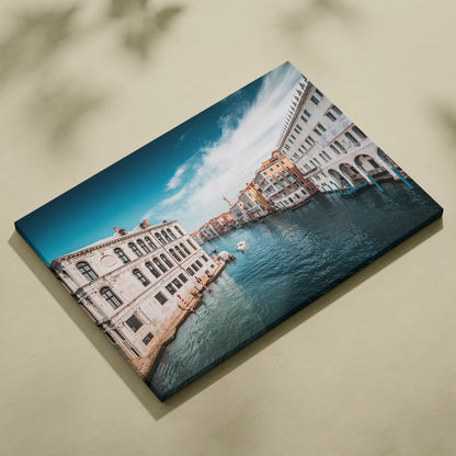 Canvas wall art featuring detailed digital architecture along a blue ocean canal under a bright sky.