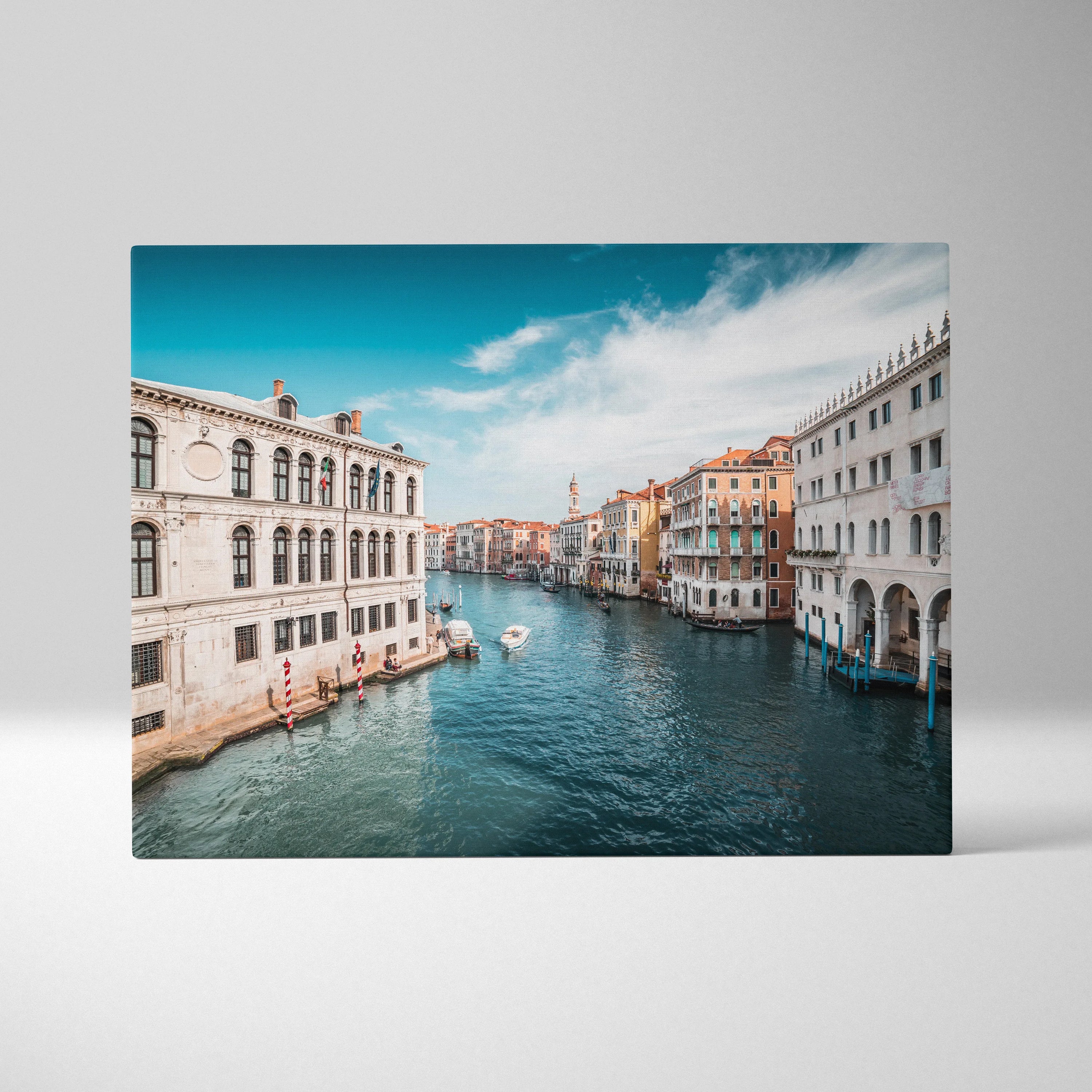 Canvas wall art of stunning digital architecture along a blue ocean canal under a bright sky.