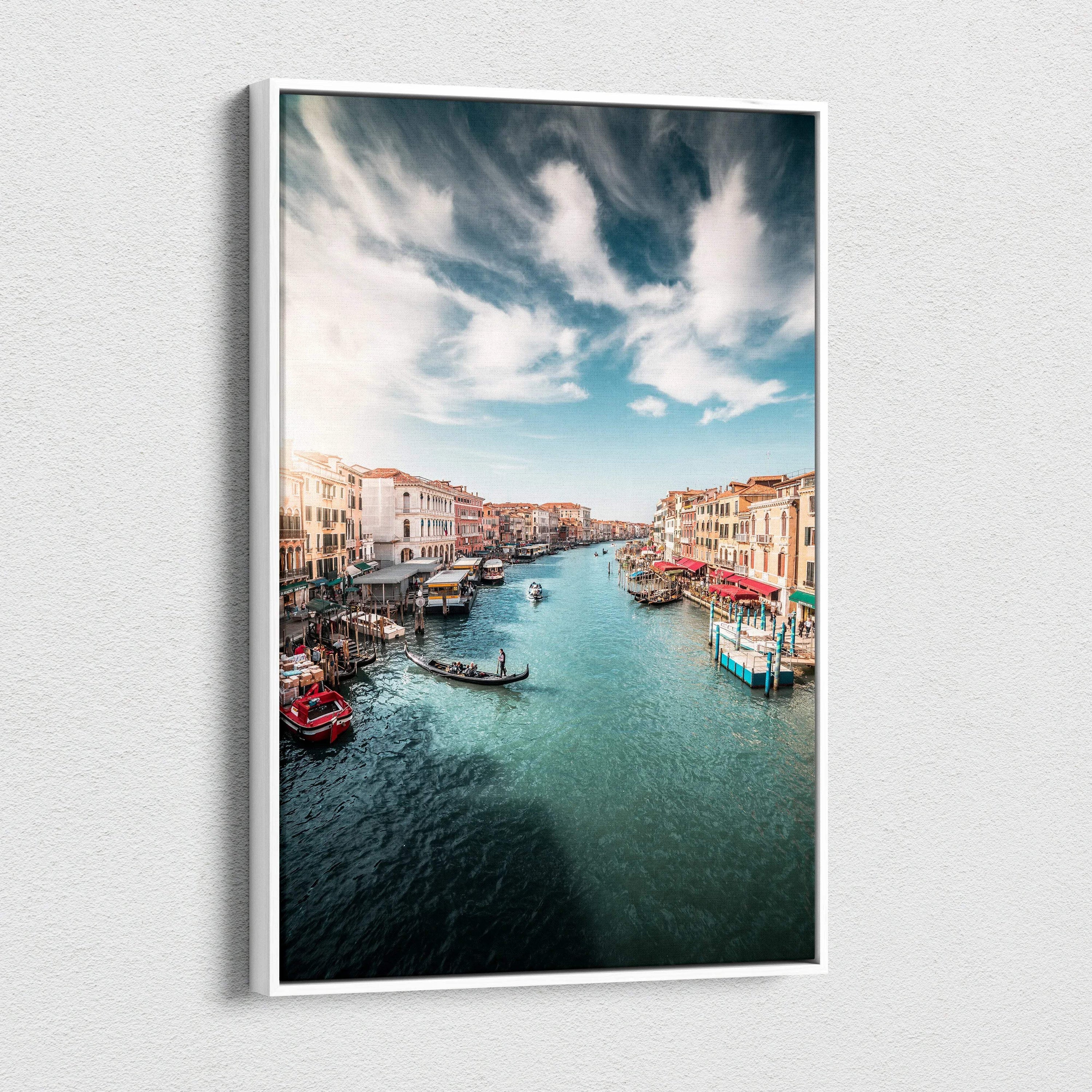 Vertical canvas wall art depicting a vibrant architecture-inspired canal scene under a dramatic sky.