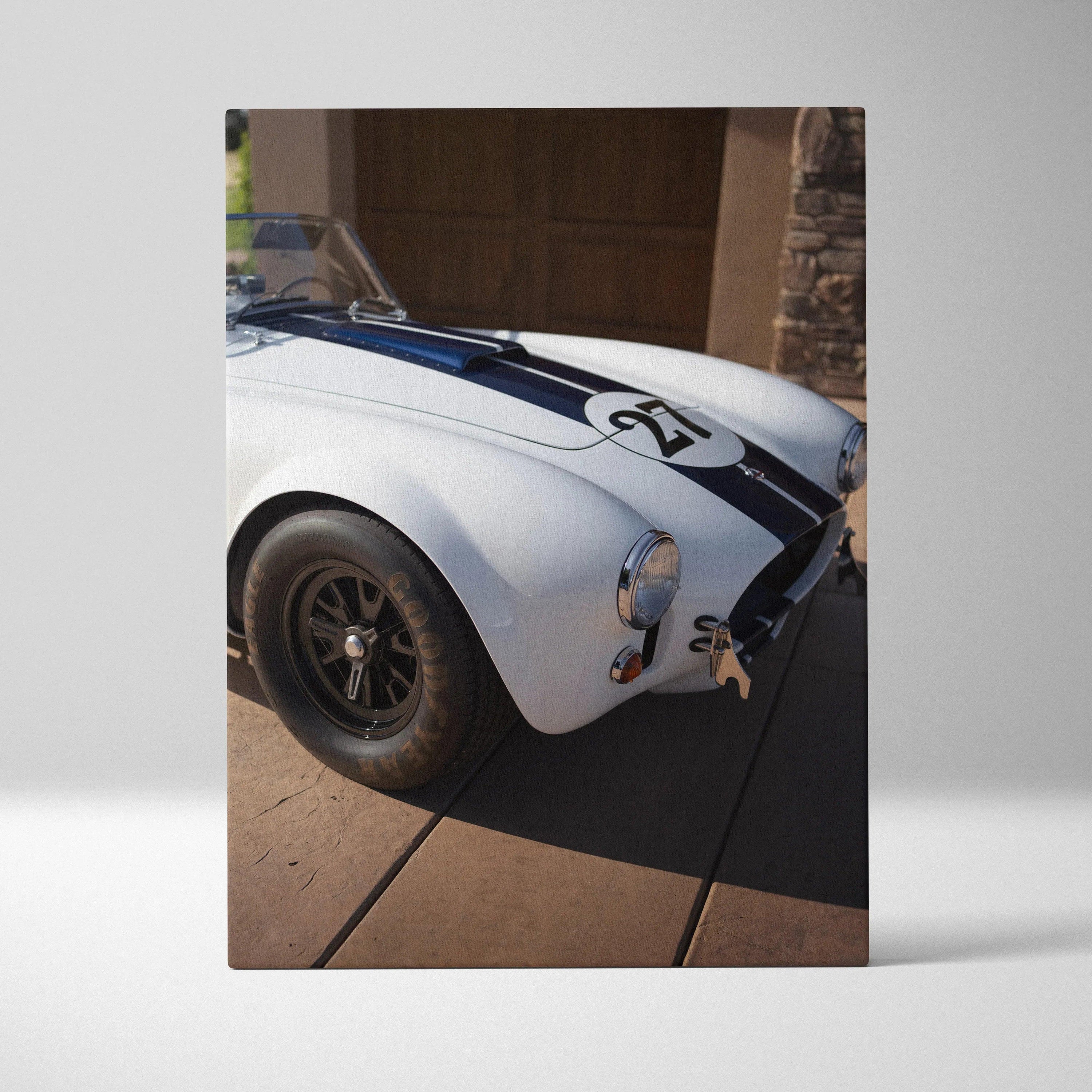 Vertical canvas wall art of white Shelby Cobra with black racing stripes and number 20 on hood.