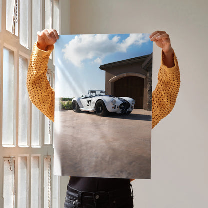 Shelby Cobra sports car parked in front of garage, high-resolution poster wall art.