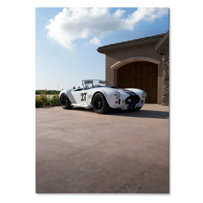 Shelby Cobra car parked on driveway with blue sky poster wall art.