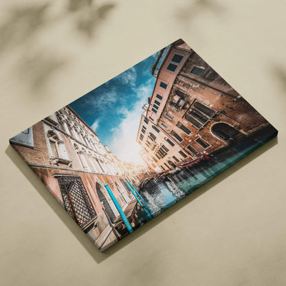 High-resolution canvas wall art featuring sunlit European canal with historic buildings and blue sky.