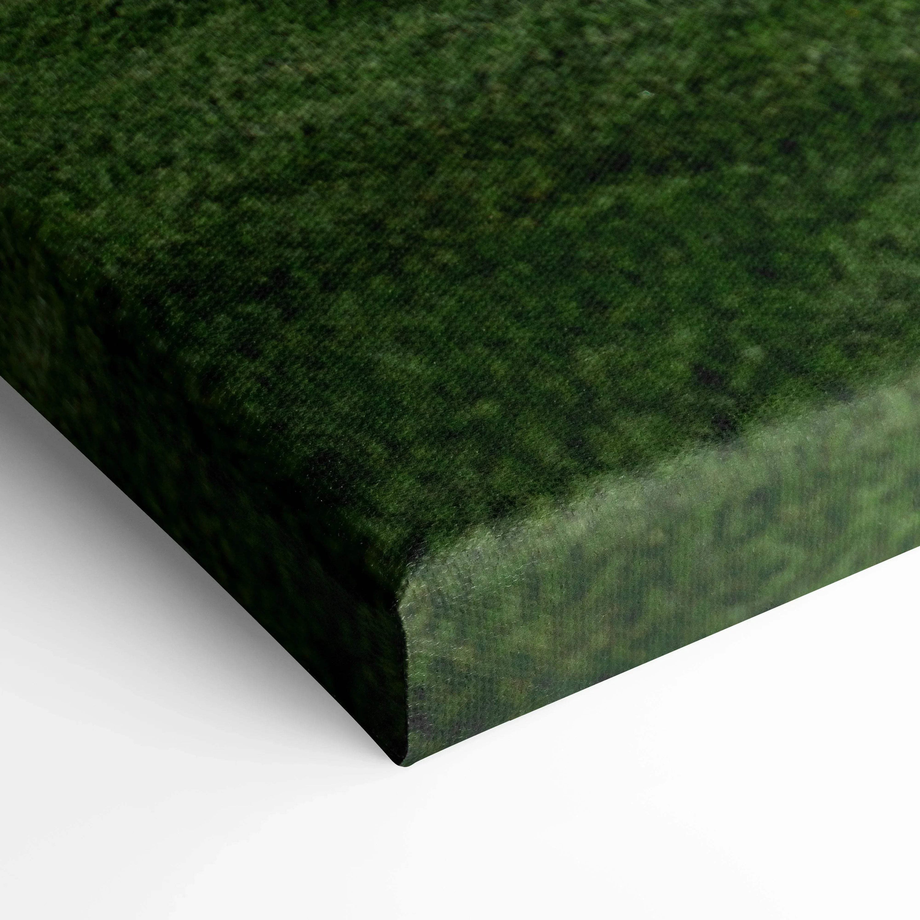 Close-up of textured green canvas wall art corner showing high-quality gallery wrap.