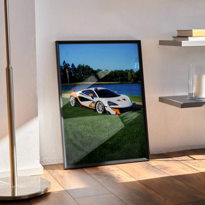 McLaren 570S car poster with black frame leaning against wall, bright outdoor scene, wall art for sports car fans.