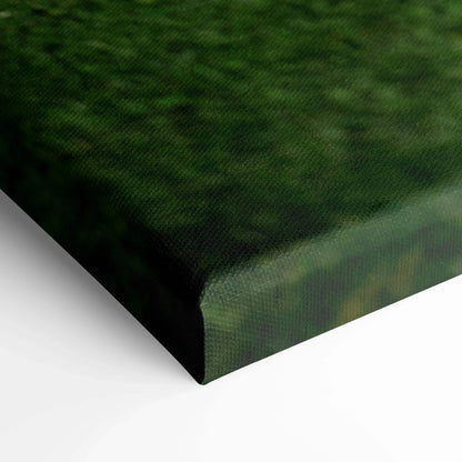 Close-up of textured green canvas art corner with sharp edges and gallery wrap style wall art.