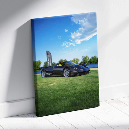 Pagani Zonda F Clubsport black sports car with open door on grass canvas wall art.