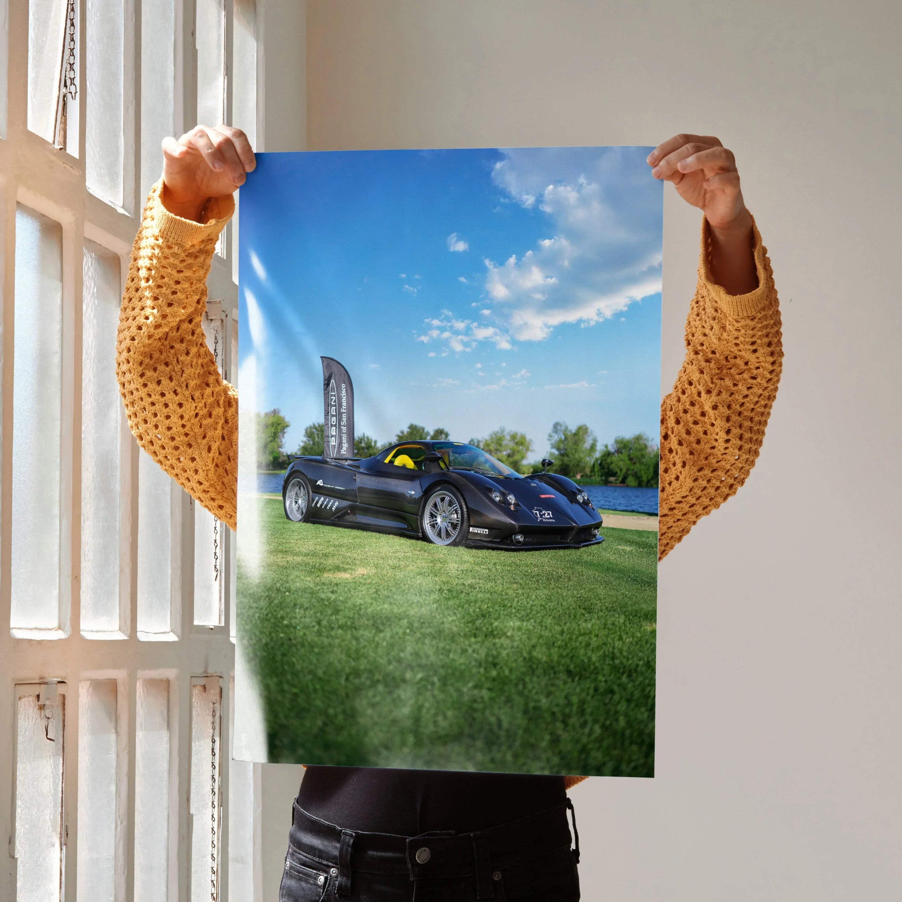 Pagani Zonda F Clubsport sports car on grass under blue sky poster wall art.
