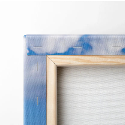 Close-up of wooden stretcher frame and blue sky canvas edge for vertical wall art canvas print.
