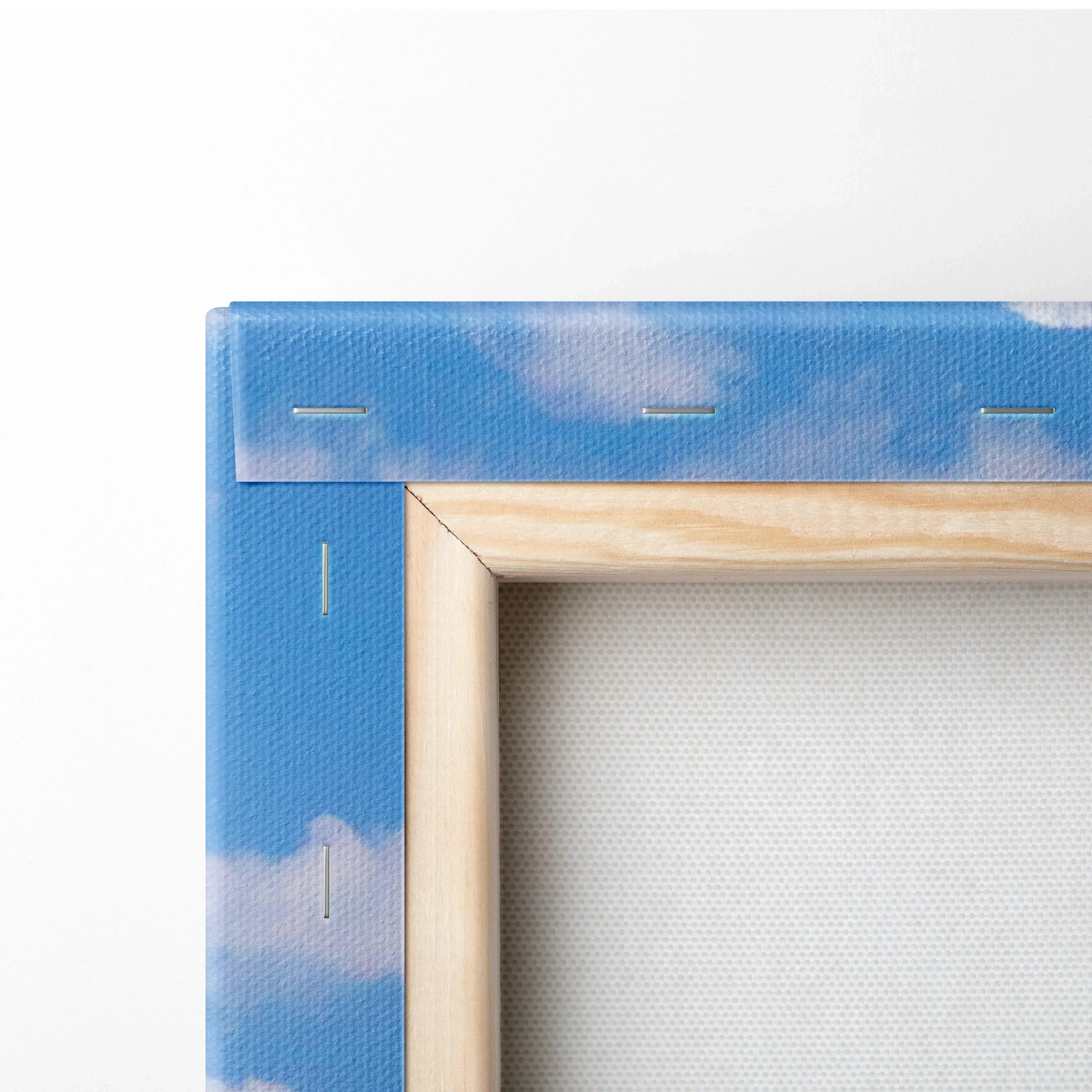 Close-up of wooden frame and blue cloud sky canvas art corner with staples on vertical wall art canvas.