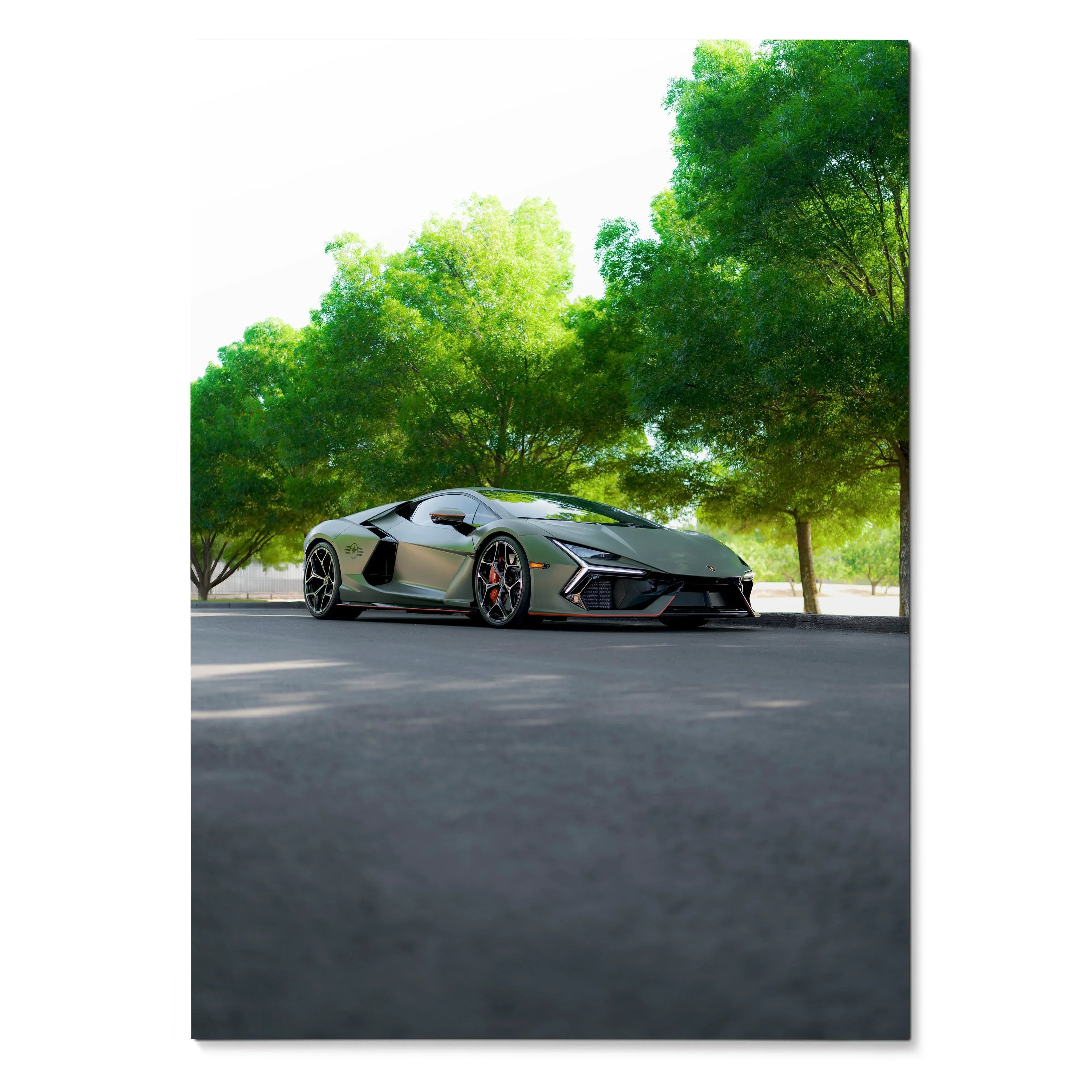 Lamborghini Revuelto parked under green trees with clear sky, sleek car poster wall art.