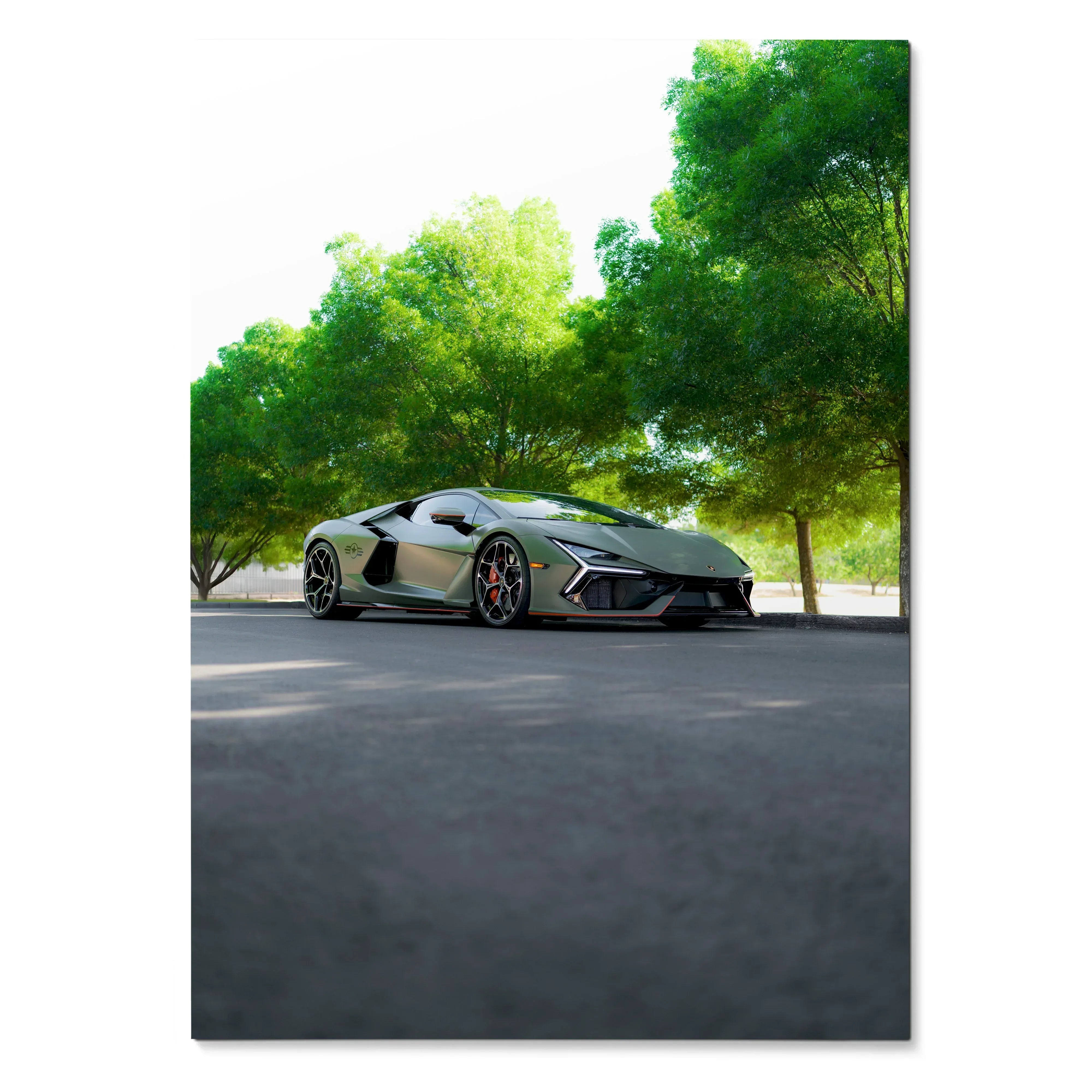 Lamborghini Revuelto parked under green trees with clear sky, sleek car poster wall art.