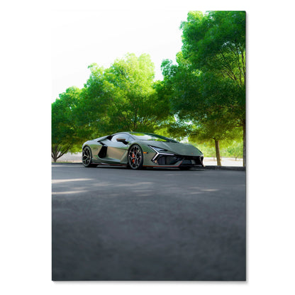 Lamborghini Revuelto parked under green trees with clear sky, sleek car poster wall art.