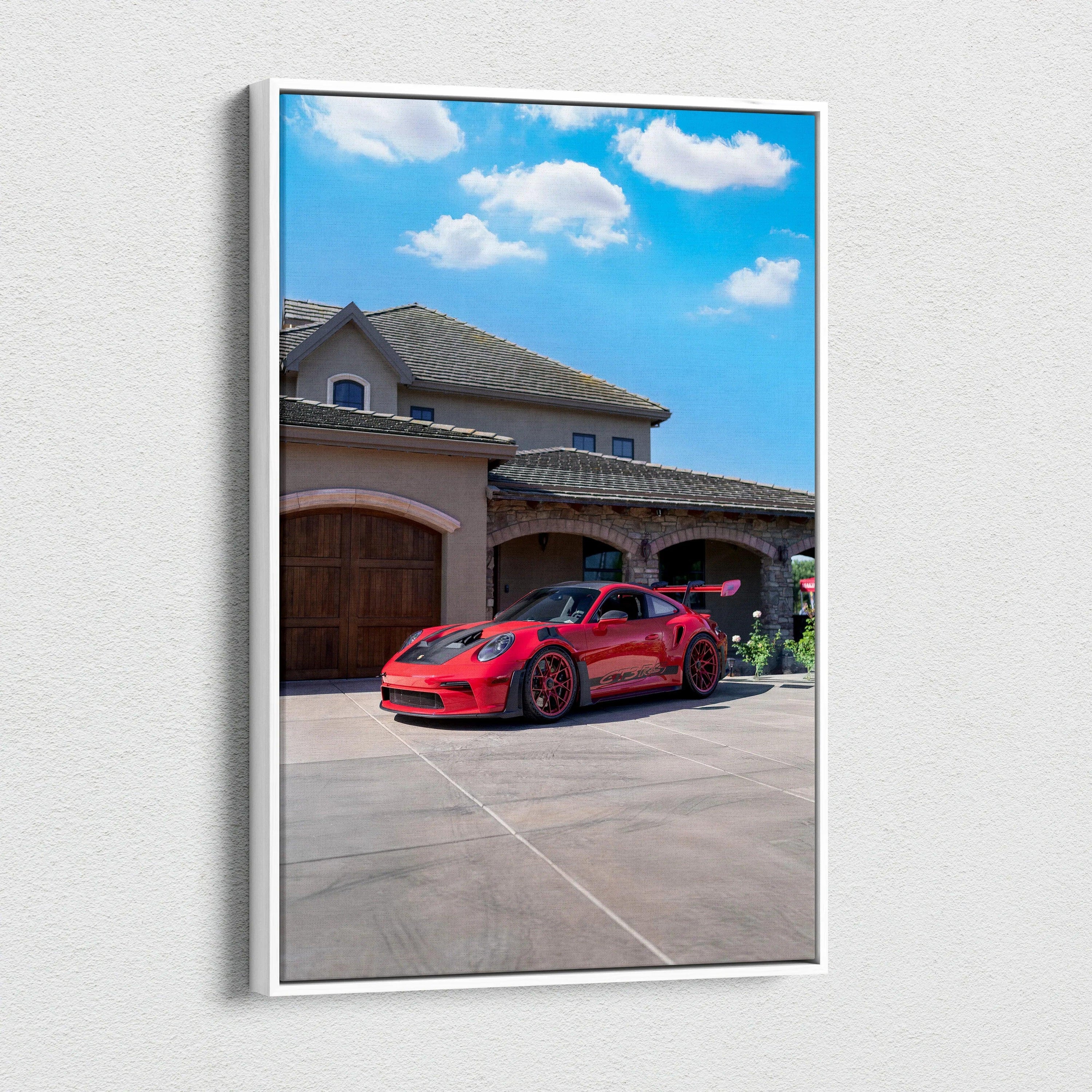 Red Porsche 911 GT3 RS parked in driveway with blue sky vertical canvas wall art.
